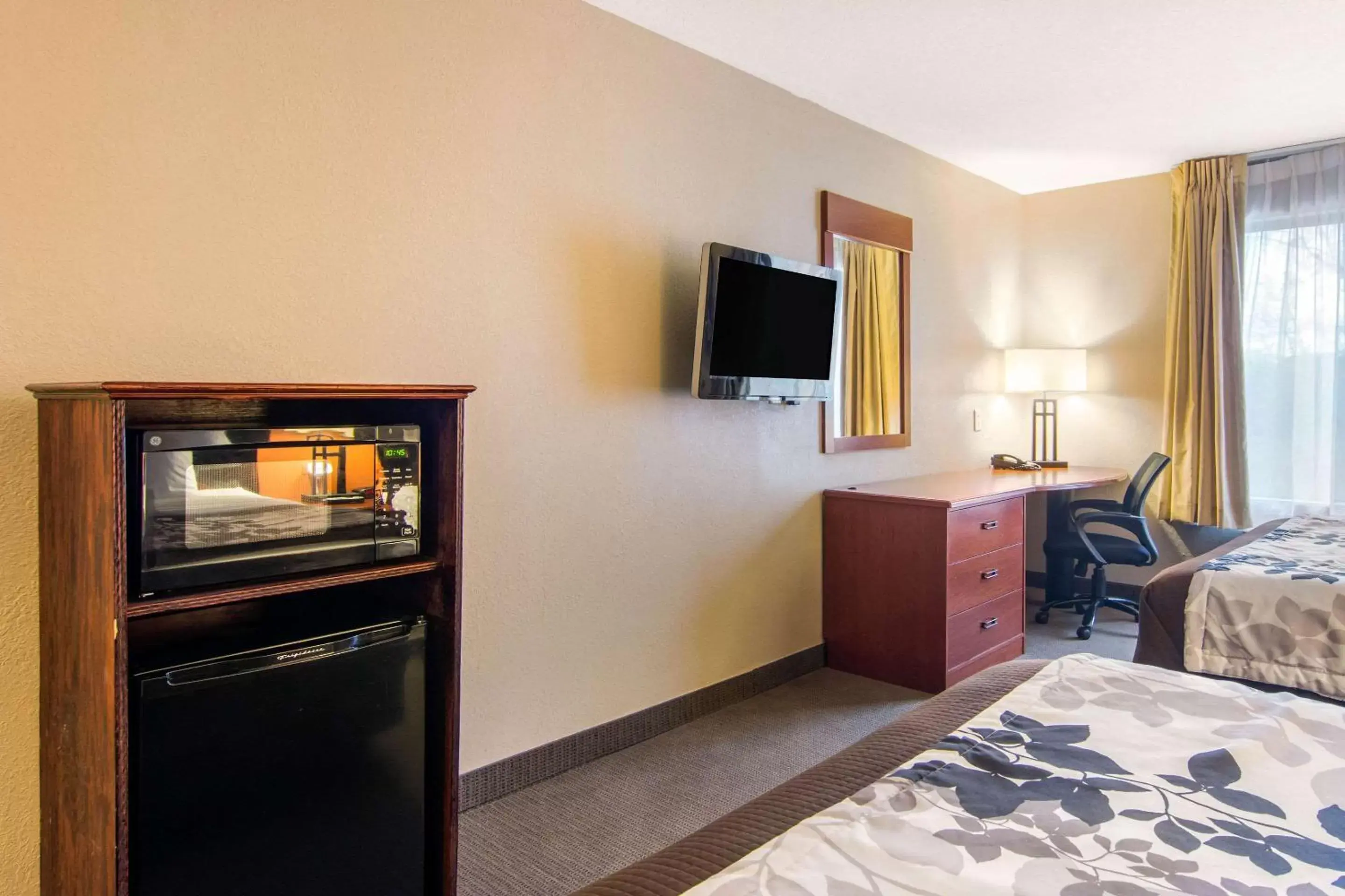 Photo of the whole room, TV/Entertainment Center in Sleep Inn & Suites