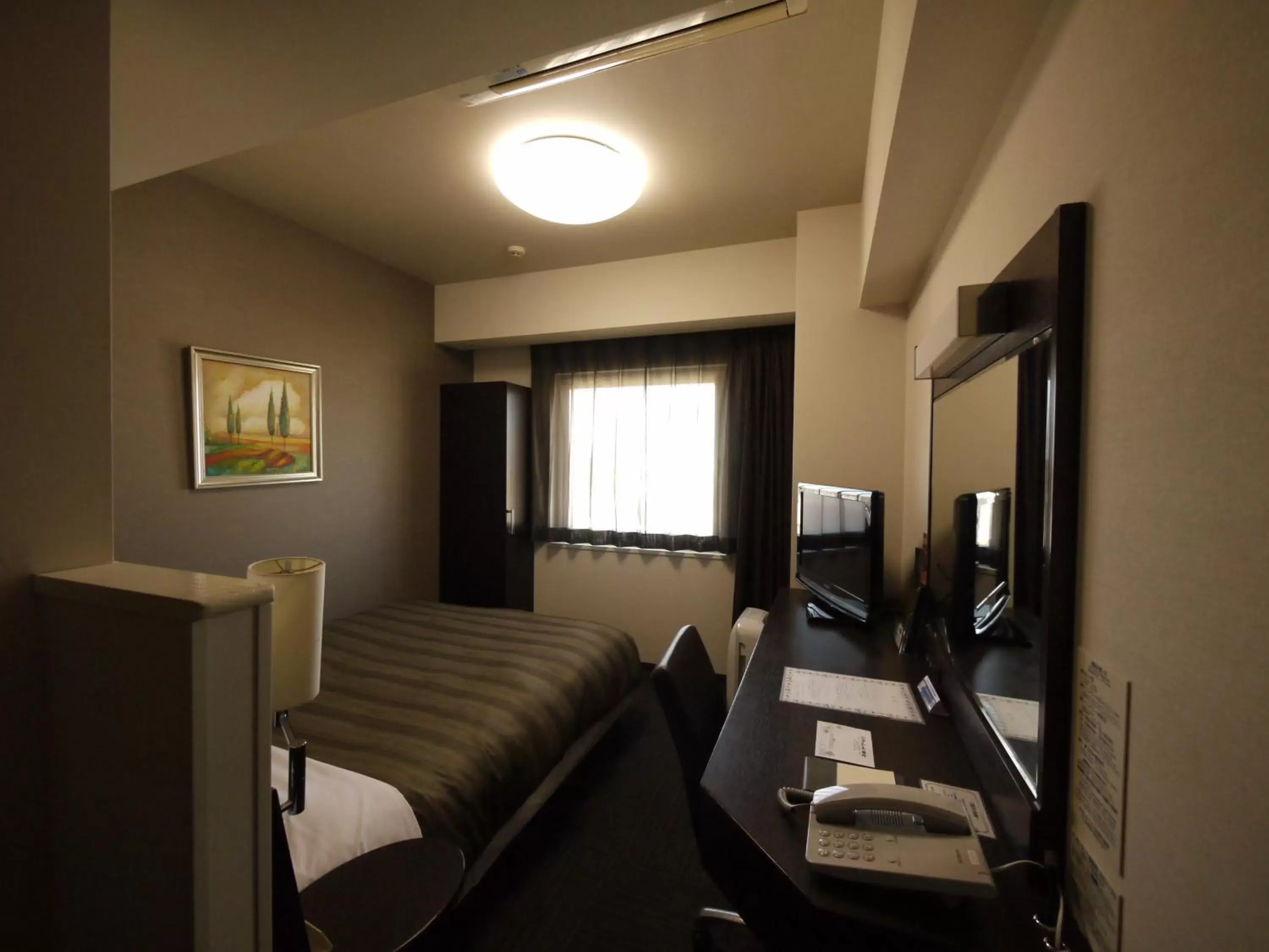 Photo of the whole room in Hotel Route-Inn Nagoya Imaike Ekimae