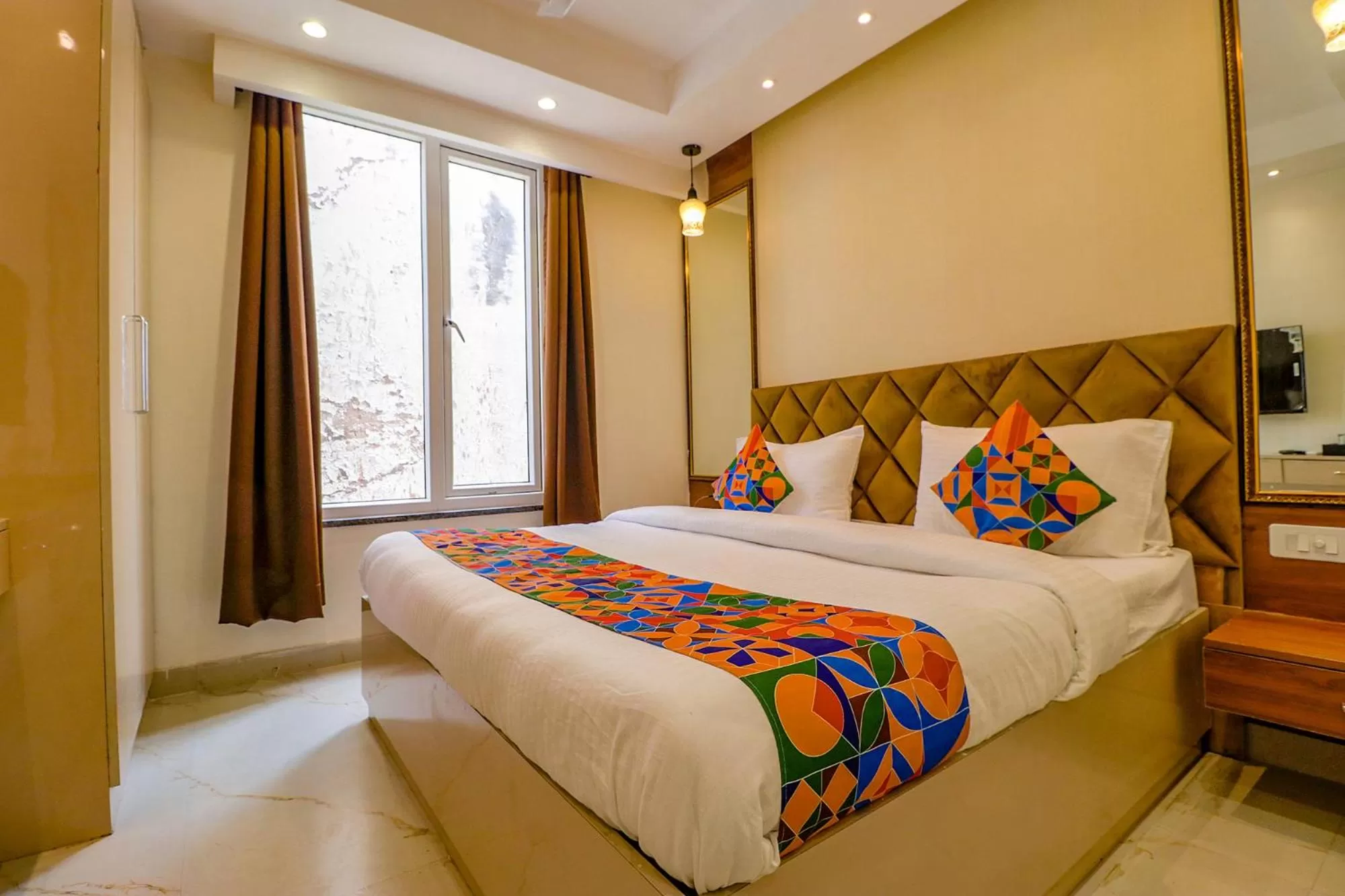 Bed in FabHotel Pitampura