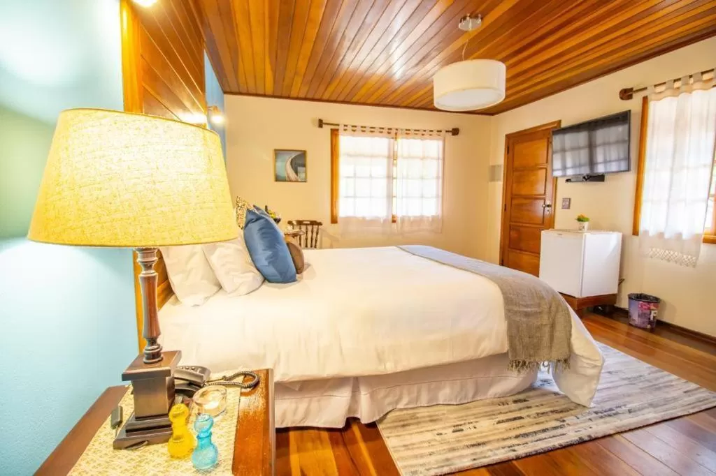 Bed in Pousada Ricanto Amore Mio