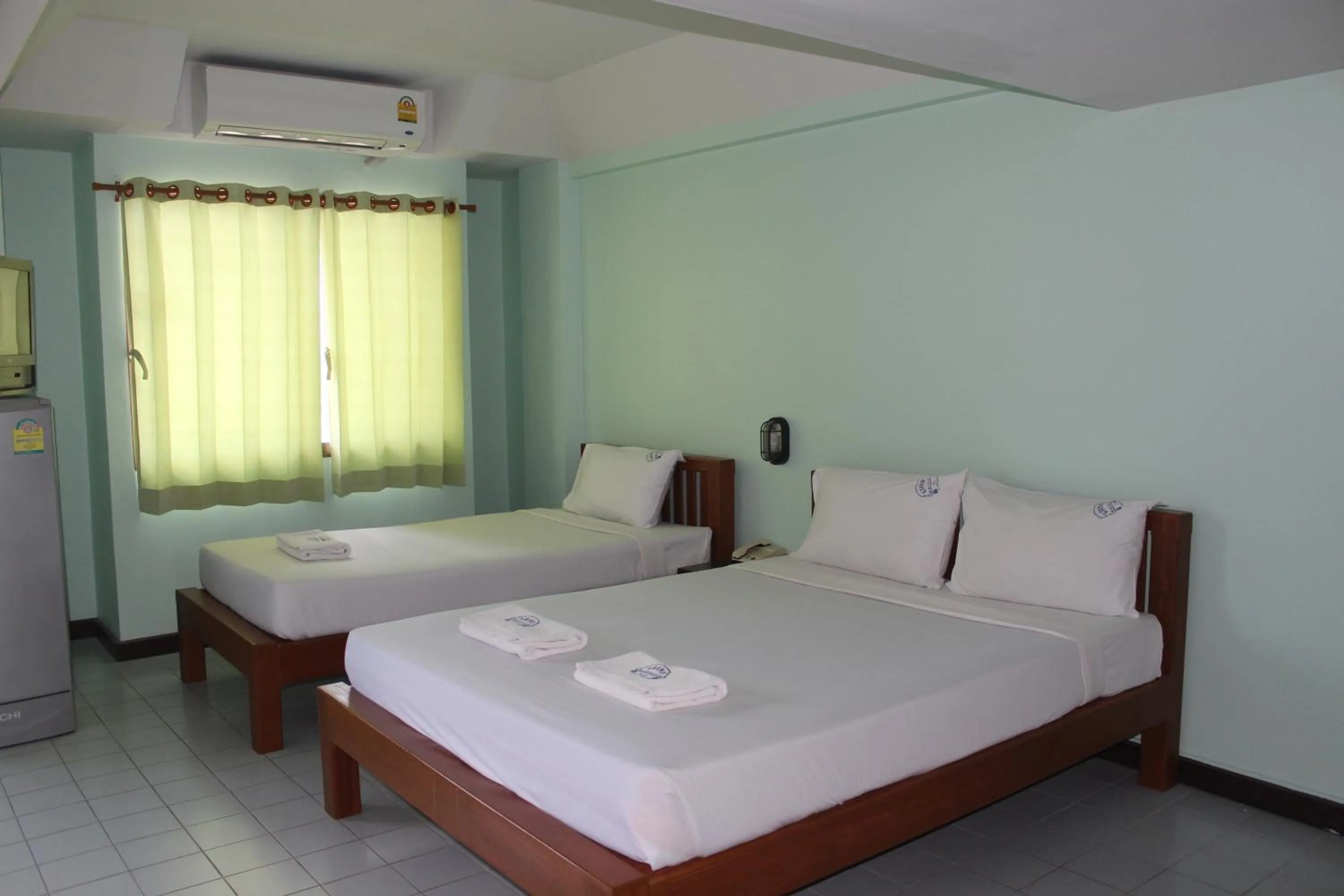 Photo of the whole room, Bed in Grand Mansion Hotel