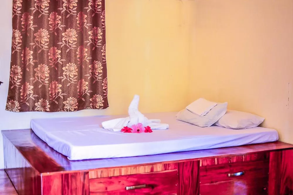 Bed in Camaya-an Paradise Beach Resort