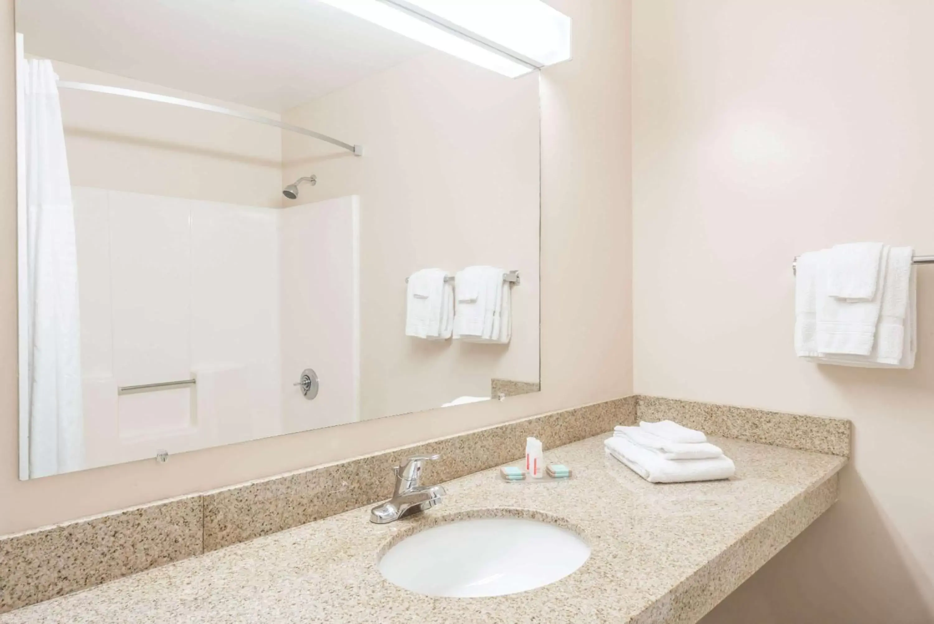 Bathroom in Days Inn by Wyndham Middletown/Newport Area