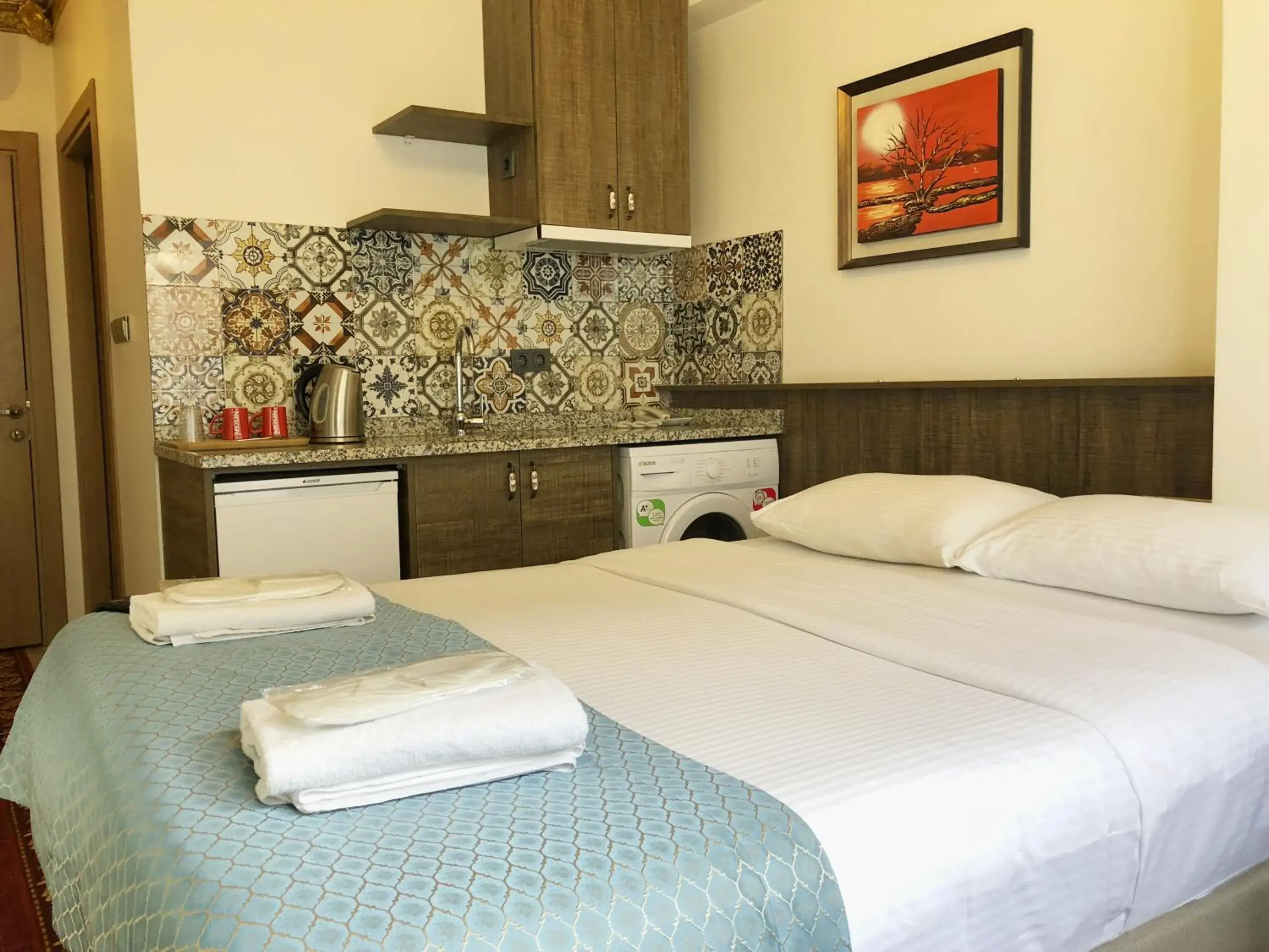 Kitchen or kitchenette, Bed in Borancik Suites