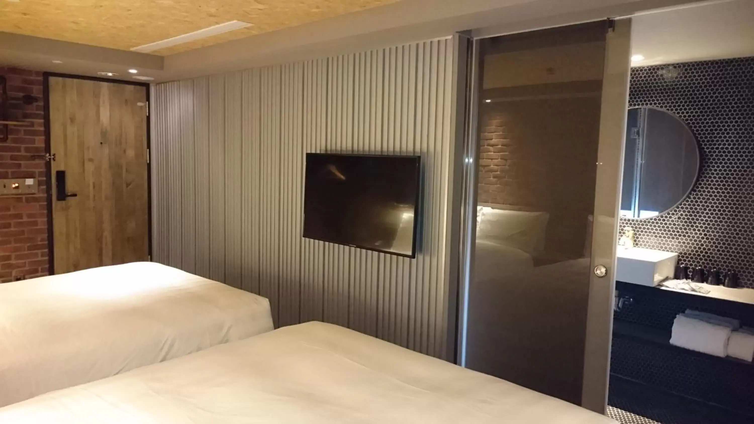 Bed, TV/Entertainment Center in City Suites - Kaohsiung Pier2