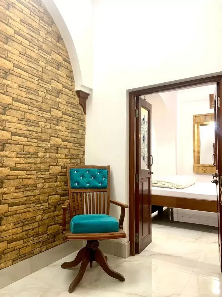 Seating area, Bed in Hotel Swagatam Seating area, Bed in Hotel Swagatam