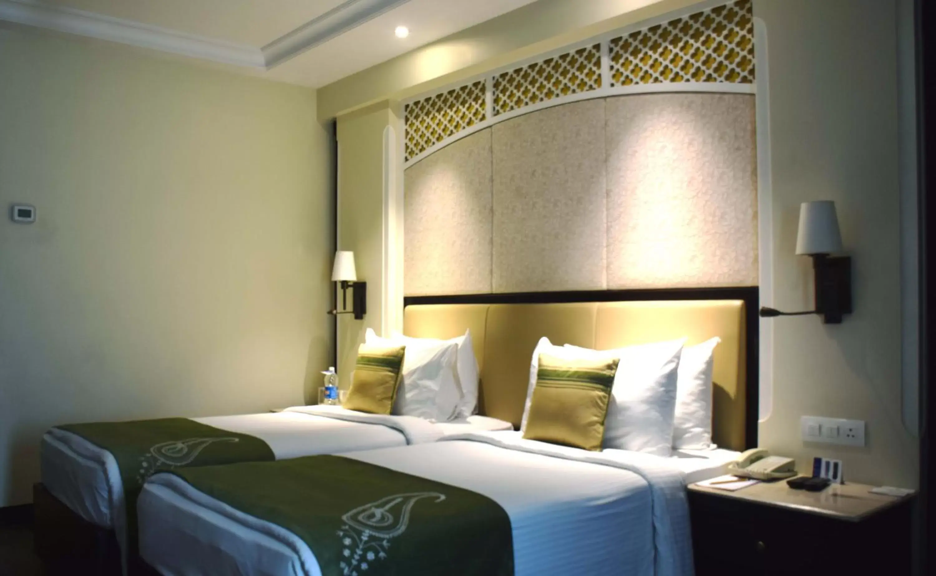 Bed in La Place Sarovar Portico