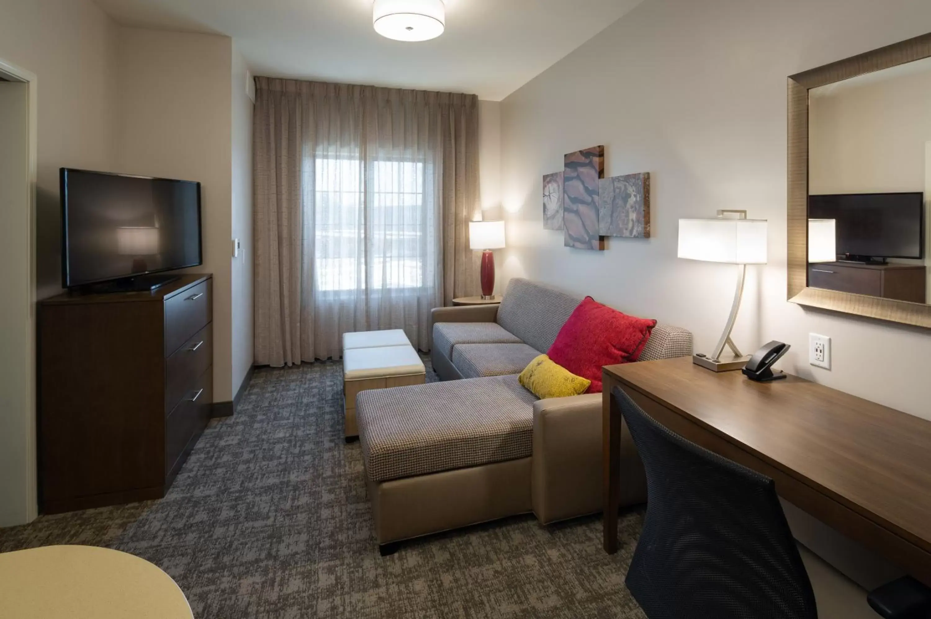 Photo of the whole room, TV/Entertainment Center in Staybridge Suites - Phoenix – Biltmore Area, an IHG Hotel