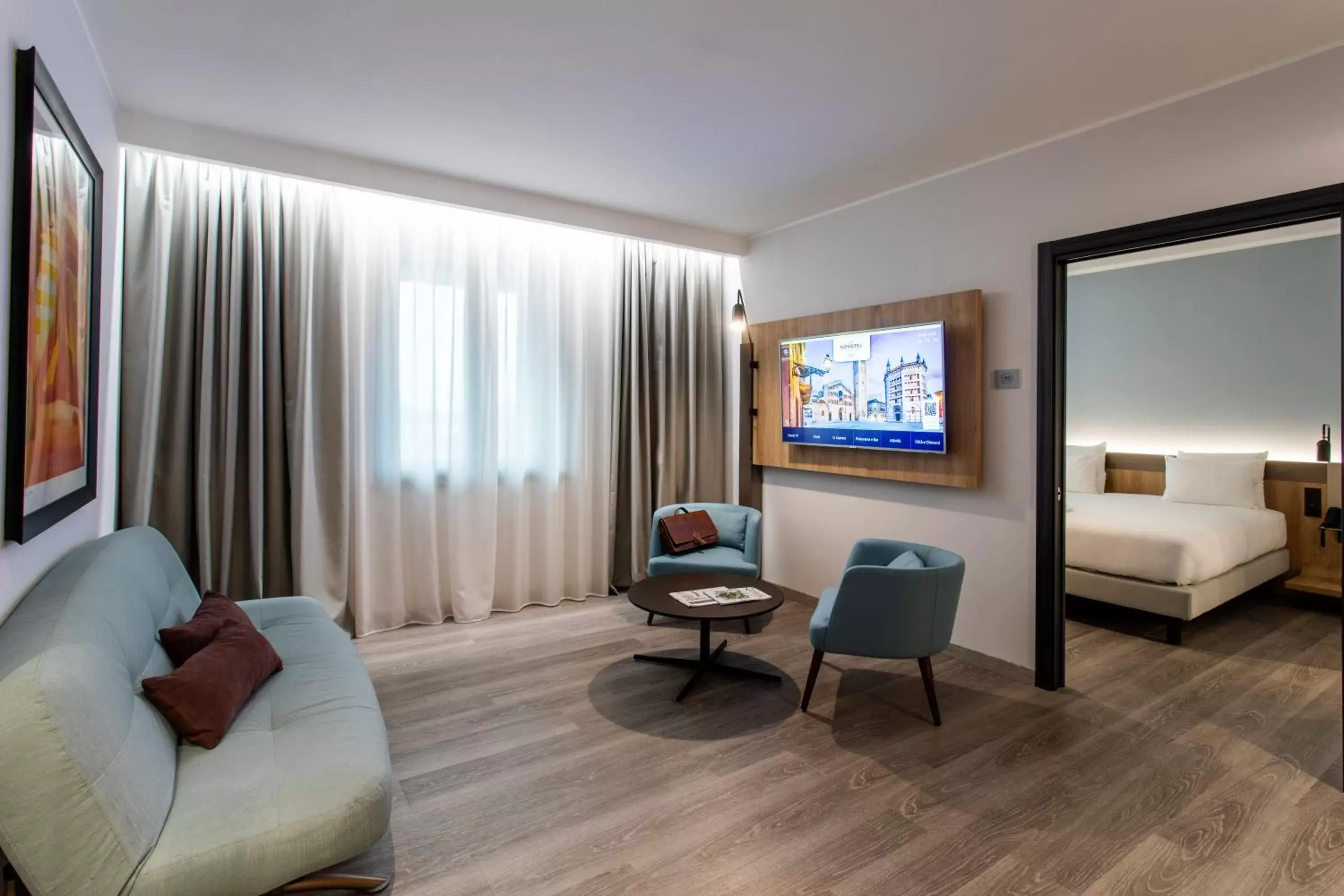 TV and multimedia, Seating Area in Novotel Parma Centro