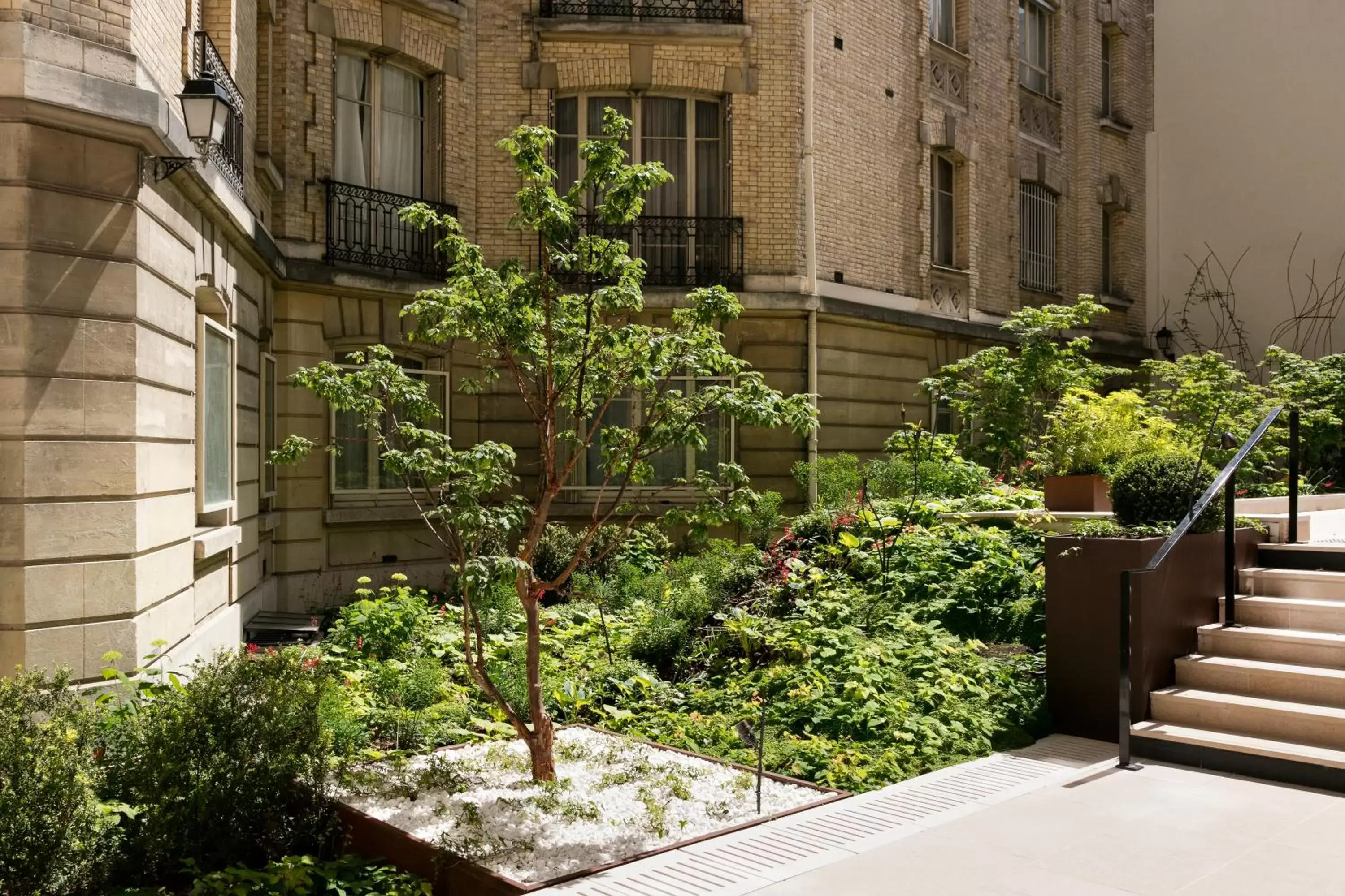 Garden in La Clef Champs-Élysées Paris by The Crest Collection