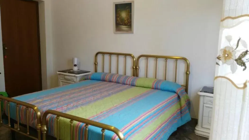 Photo of the whole room, Bed in Il Giardino del Gallo