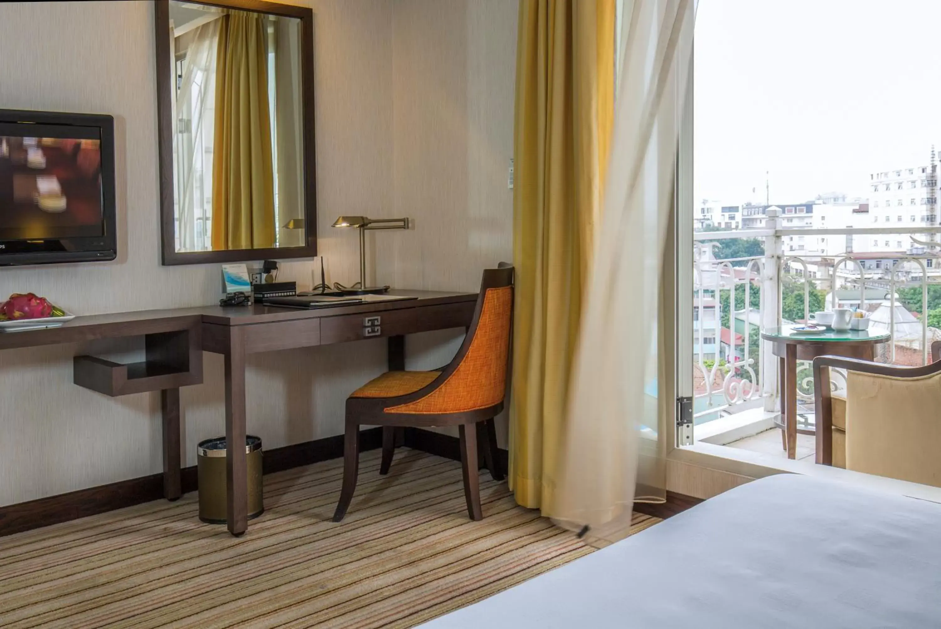 Bed, TV/Entertainment Center in Silk Path Hanoi Hotel