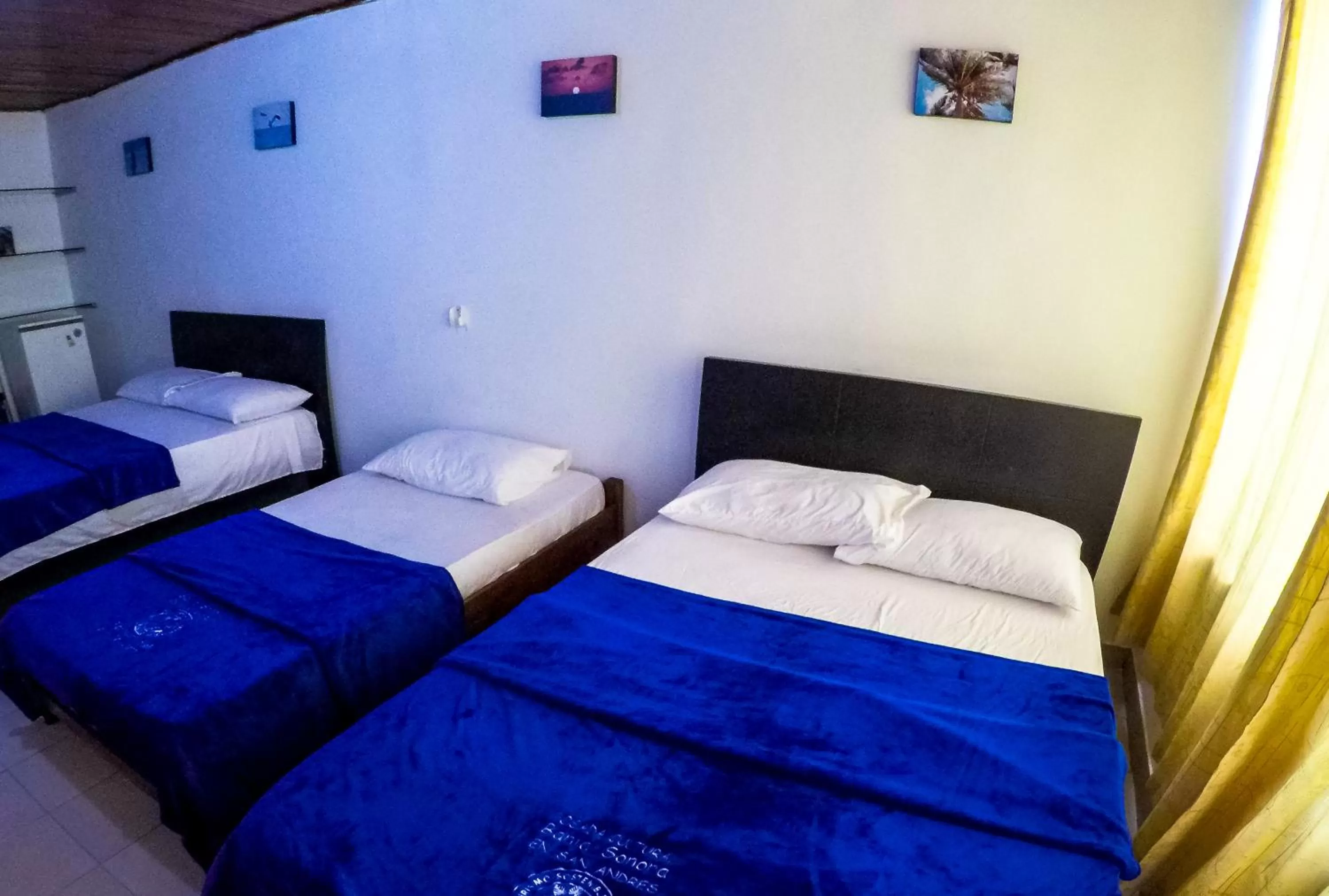 Bed in Posada Cultural Bahia Sonora