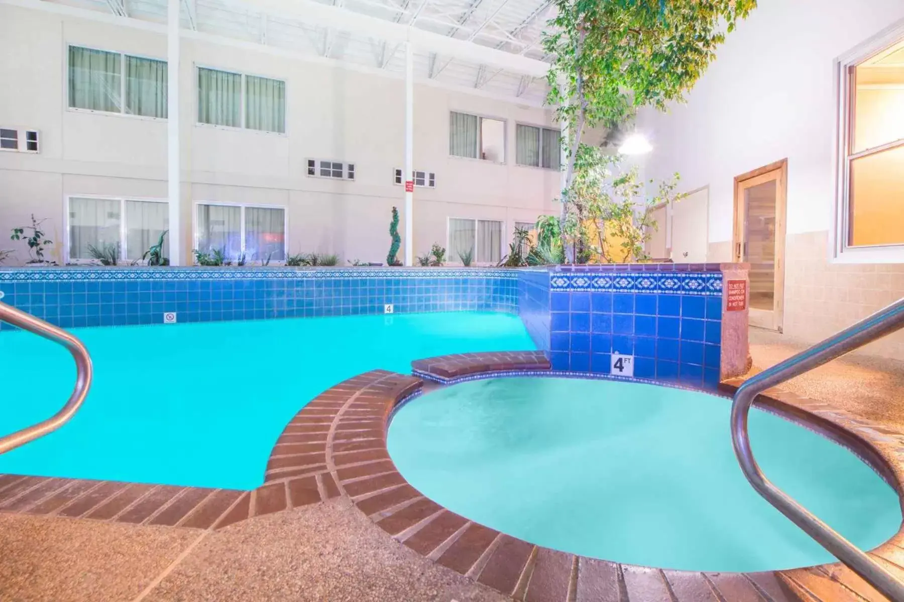 Hot Tub, Swimming Pool in Ramada by Wyndham Enid