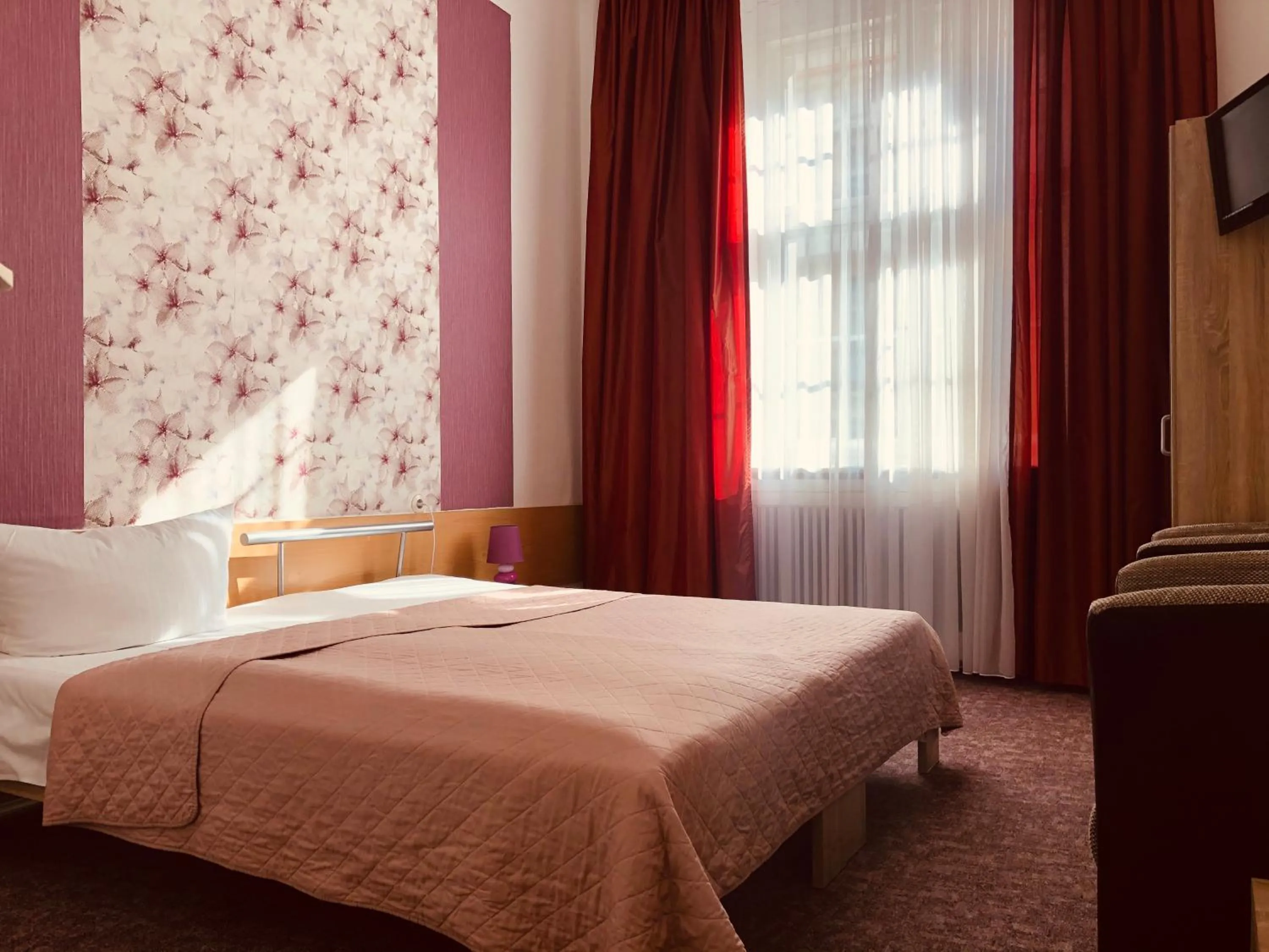 Bed in Hotel Castell am Kurfürstendamm