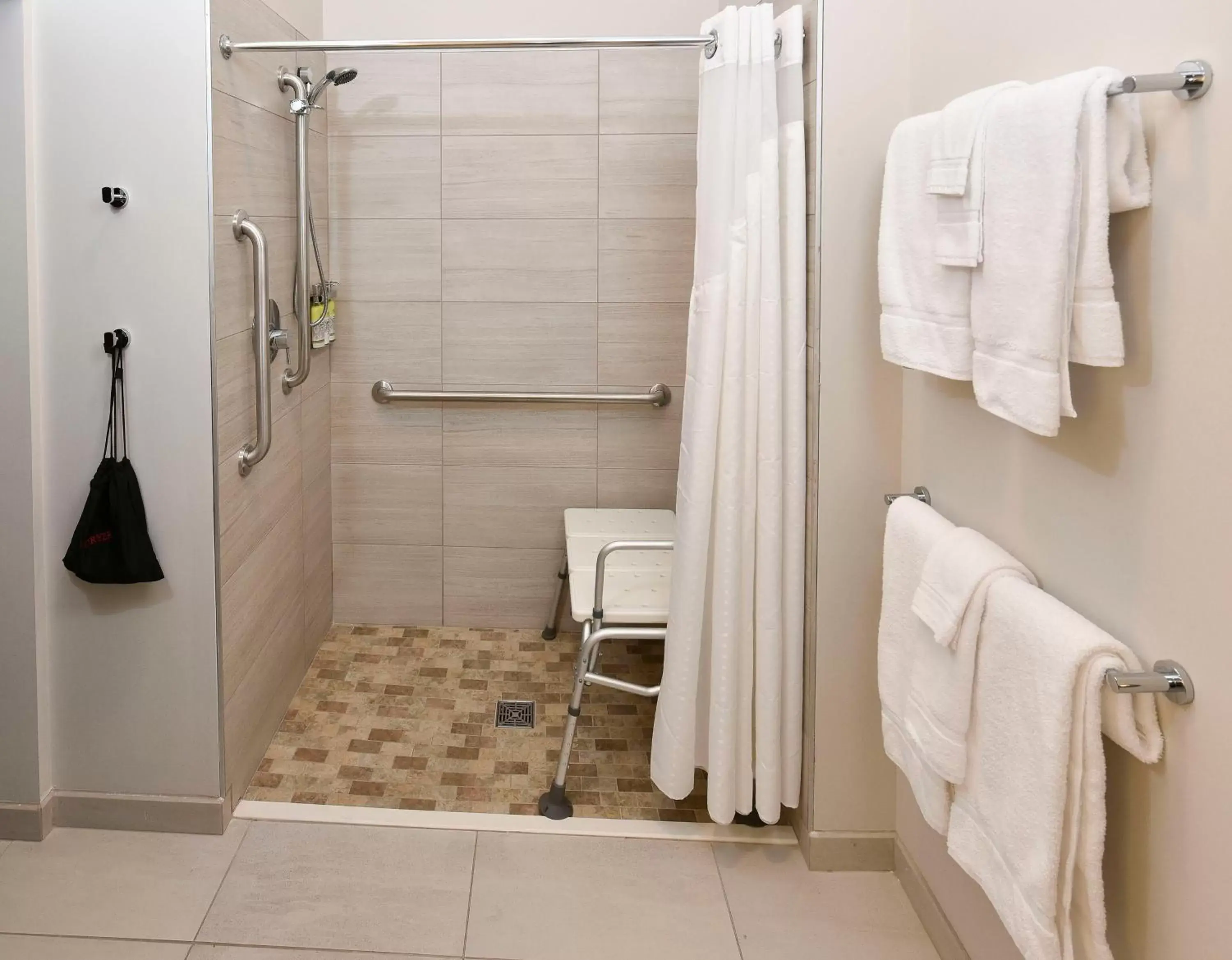 Bathroom in Holiday Inn Express & Suites - Madisonville, an IHG Hotel