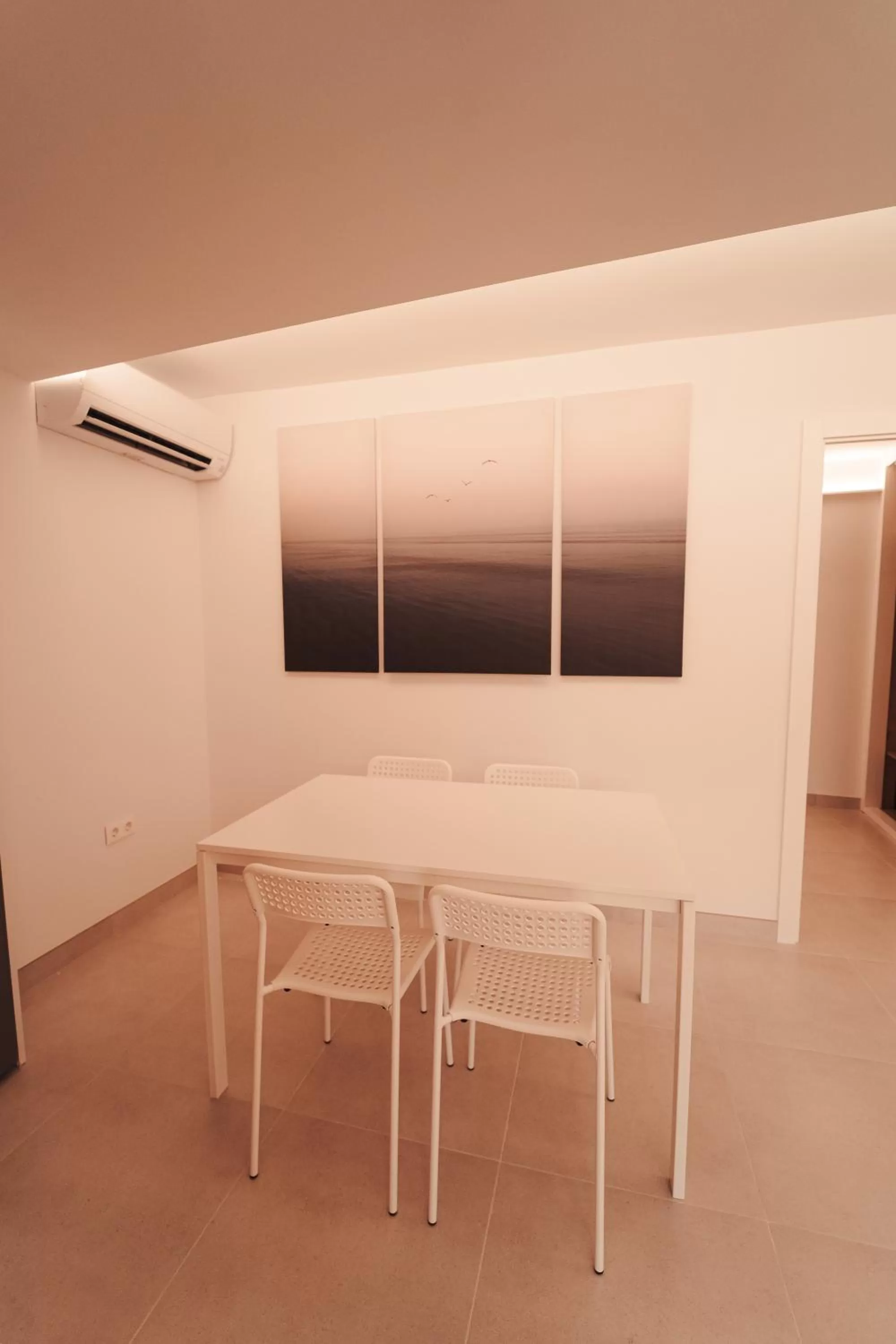 Living room, Dining Area in Palm Suites