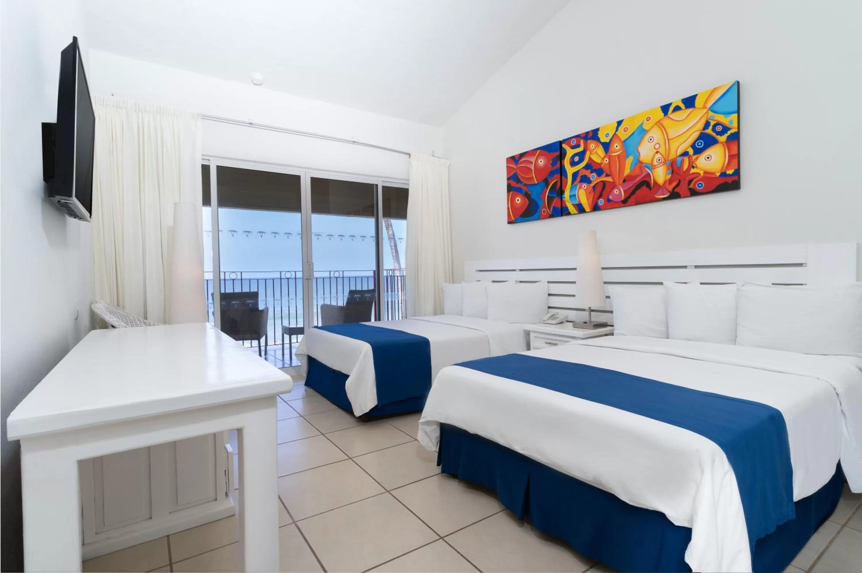 Bed in Grand Decameron Complex Bucerias, A Trademark All-Inclusive Resort