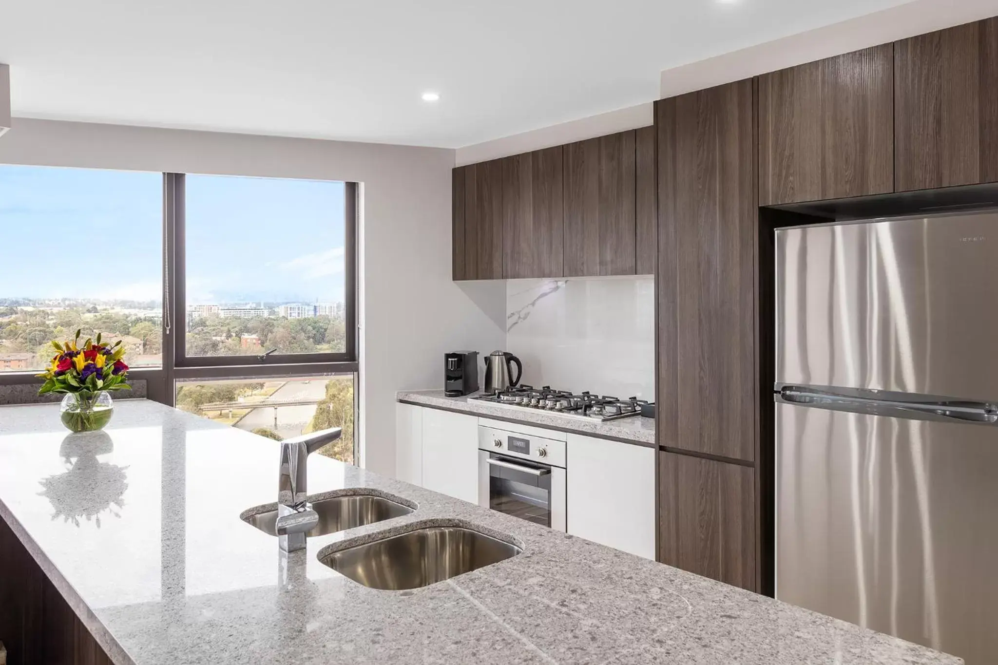 Kitchen or kitchenette, Kitchen/Kitchenette in Meriton Suites Church Street, Parramatta