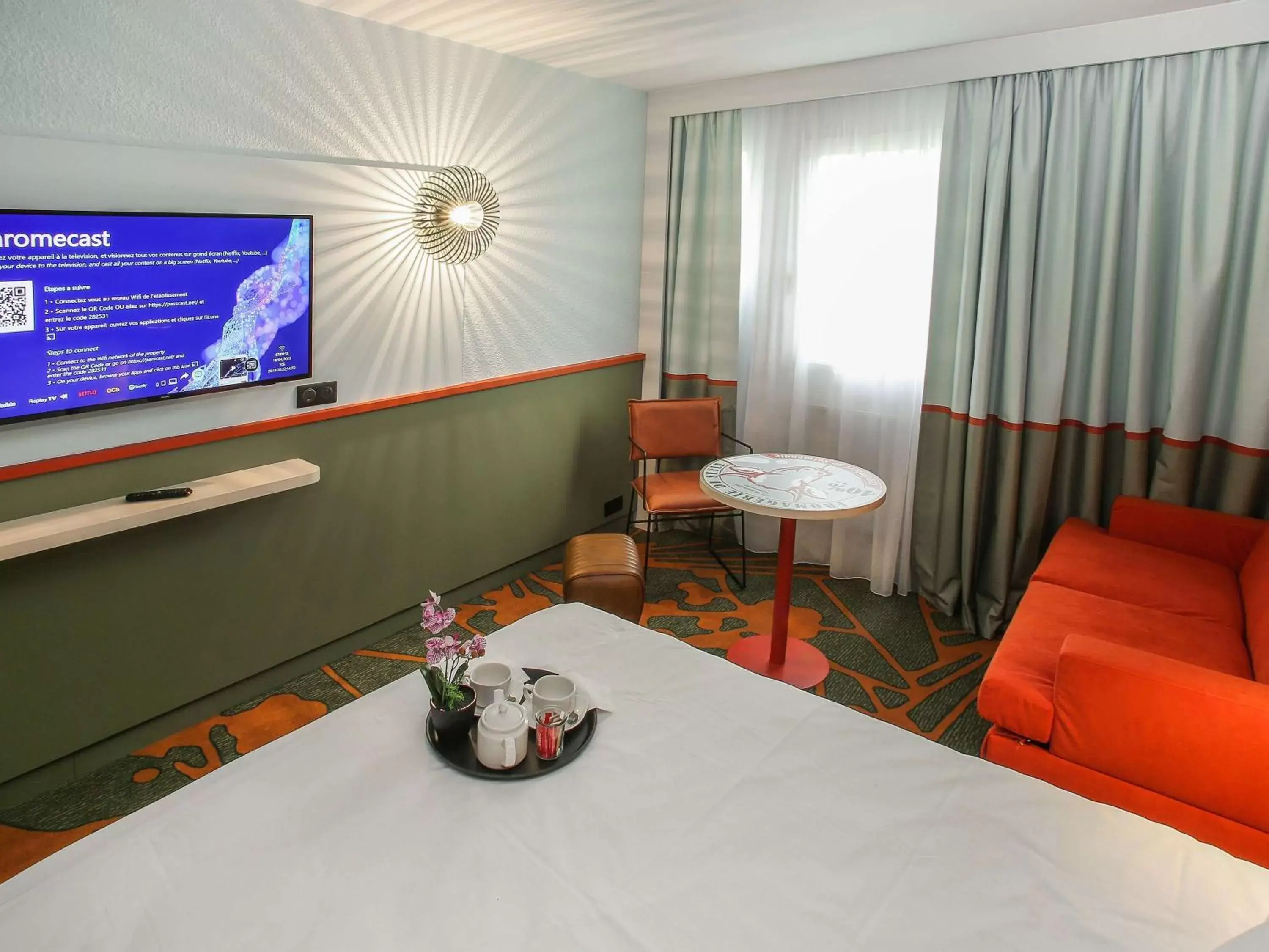 Bedroom, TV/Entertainment Center in Hotel Ibis styles Lisieux ex Mercure