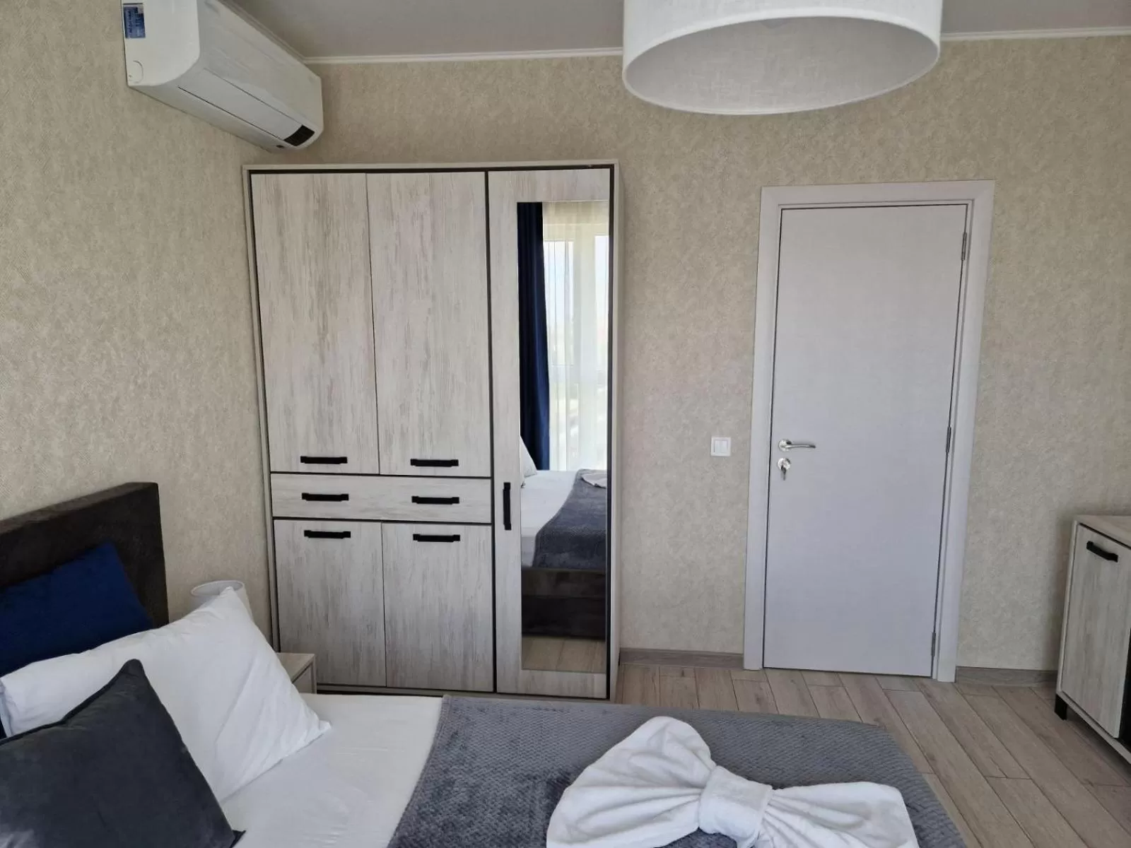 Bed in PAPAYA APARTMENTS