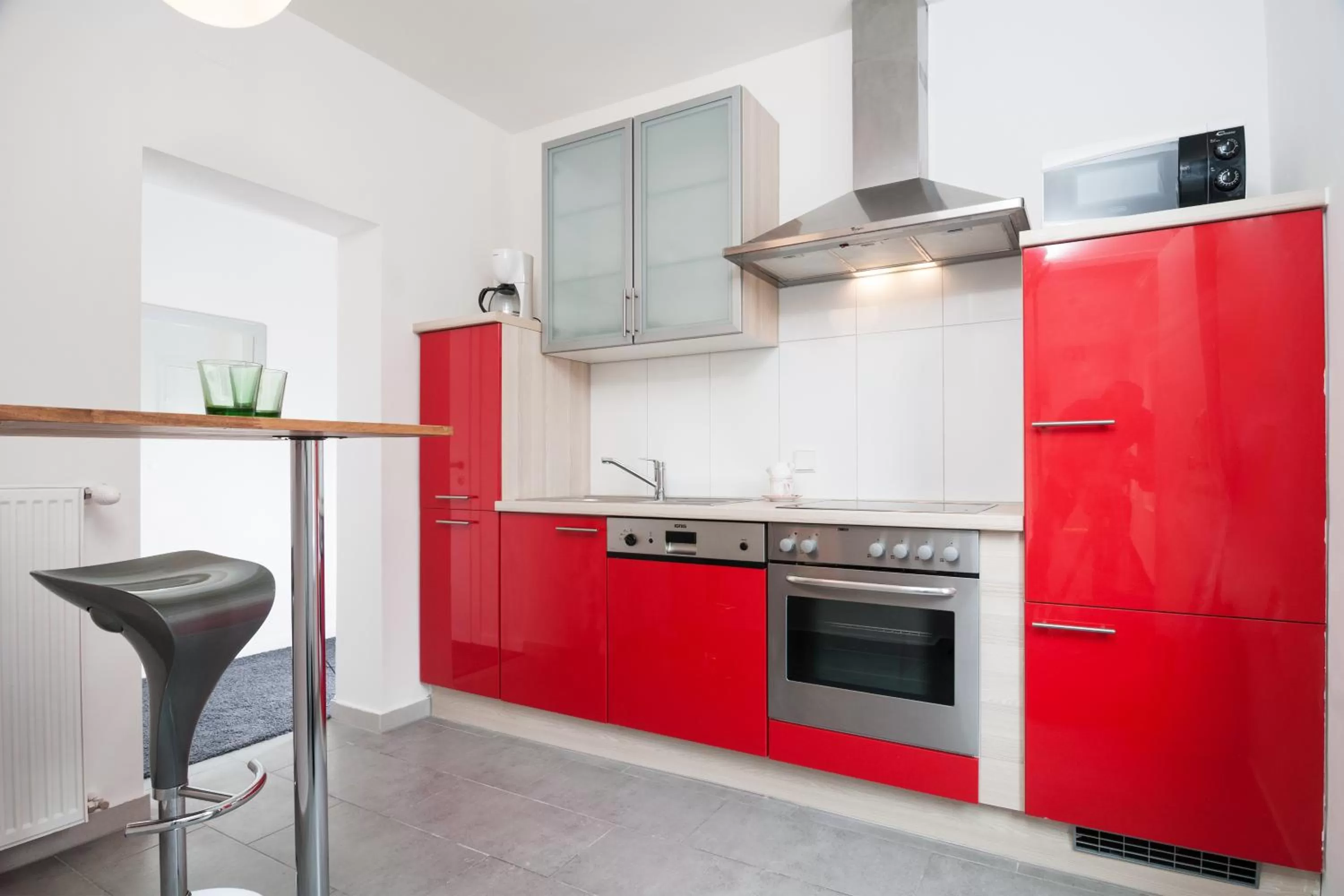 Kitchen or kitchenette in Hotel Velden - 24 Checkin Zimmer im Zentrum