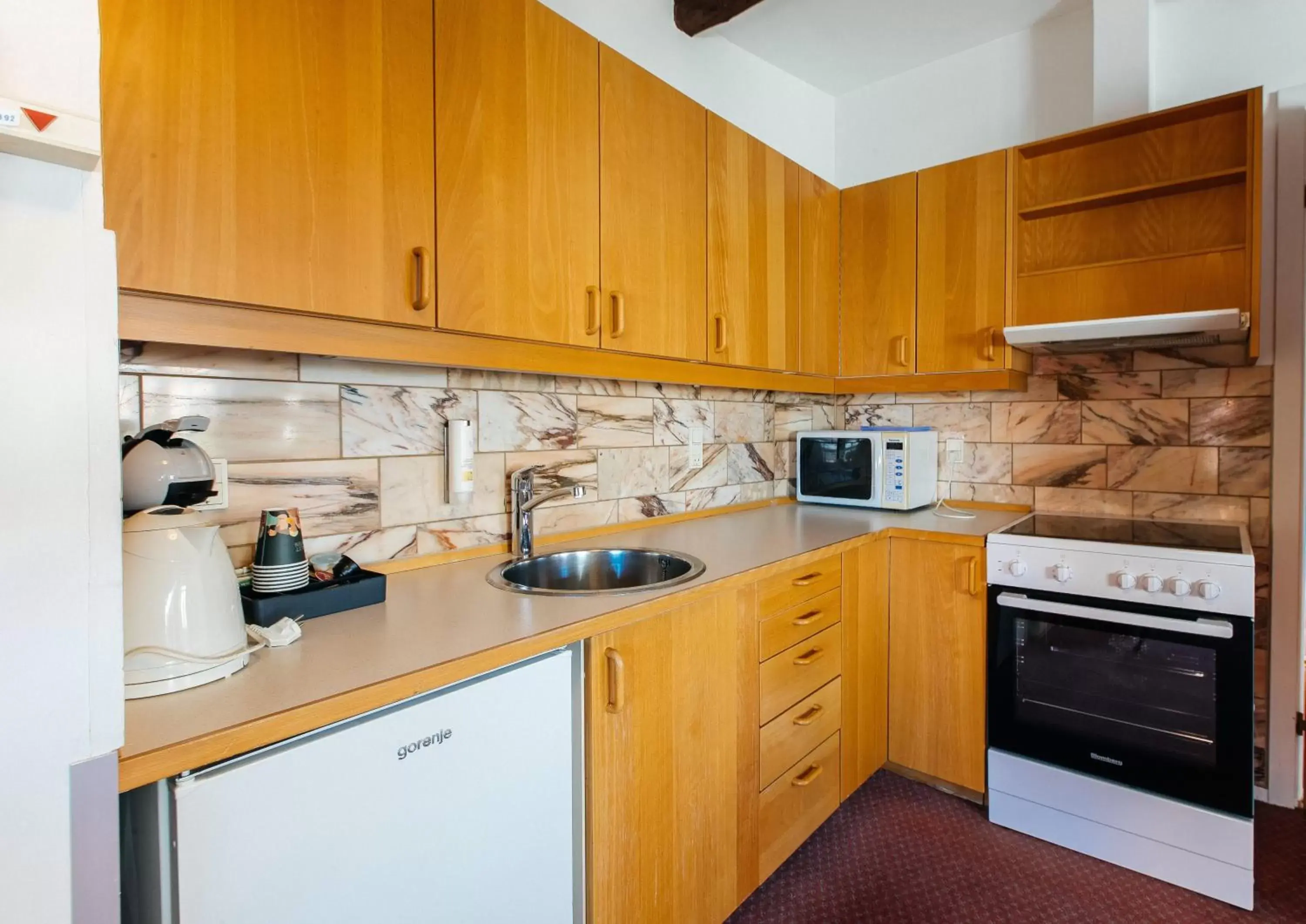 Kitchen or kitchenette, Kitchen/Kitchenette in Palads Hotel