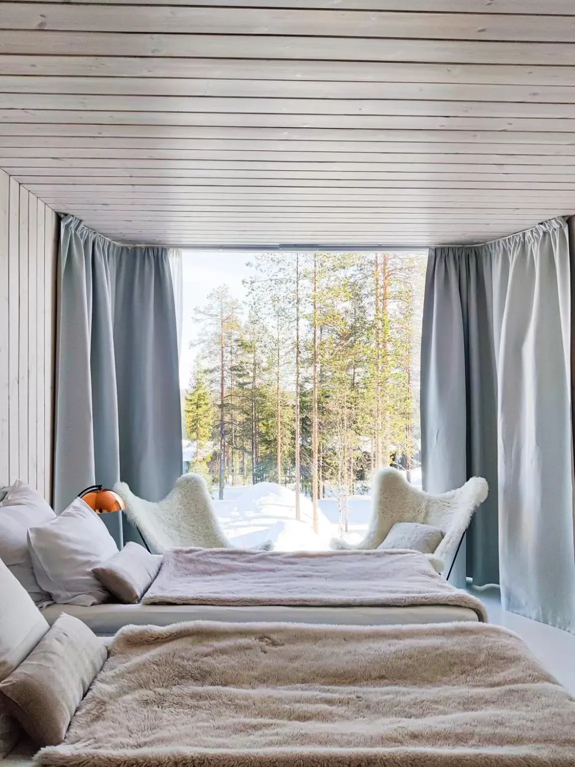 Bed in Arctic TreeHouse Hotel