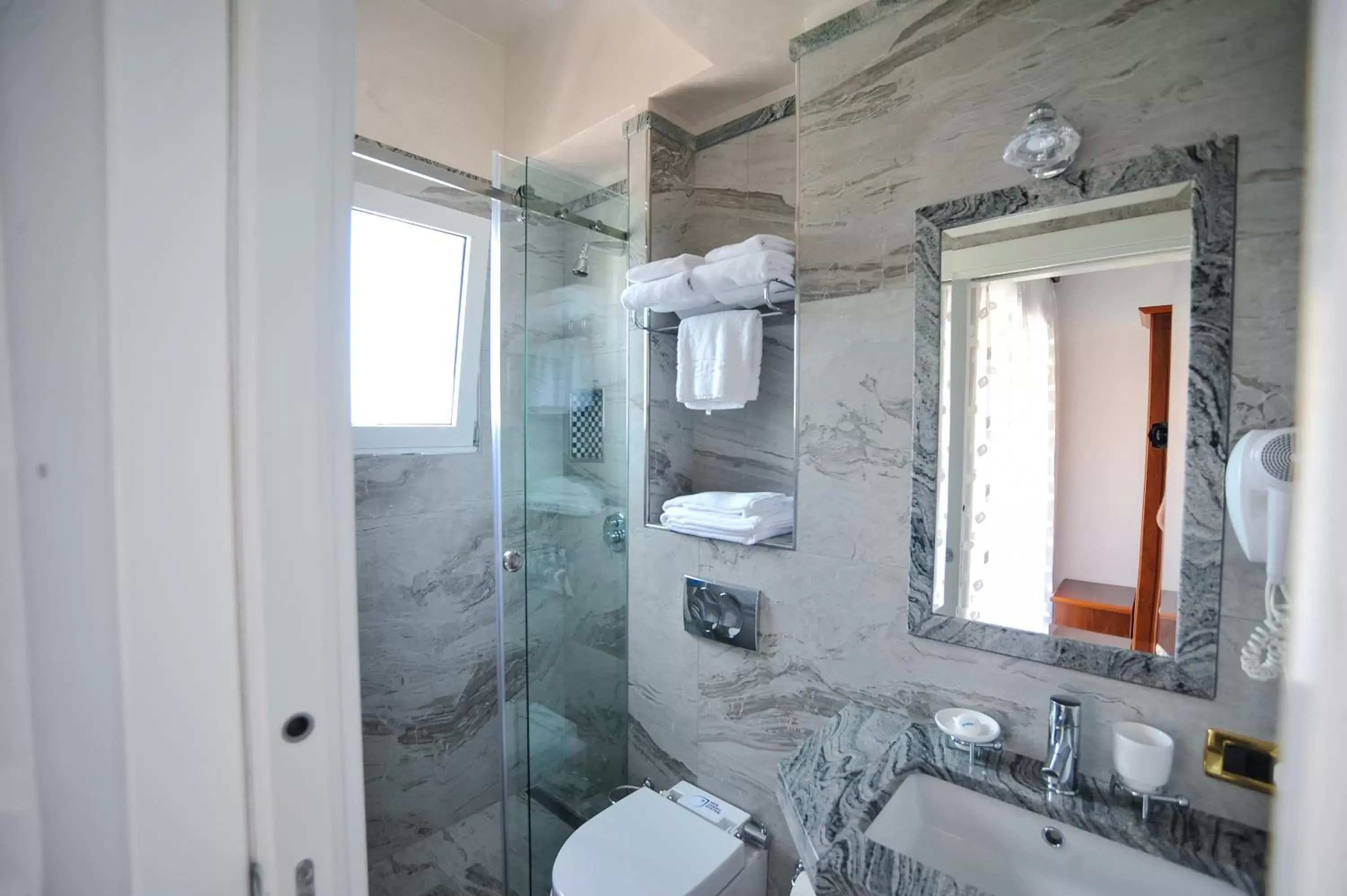 Bathroom in Iliria Internacional Hotel Bathroom in Iliria Internacional Hotel