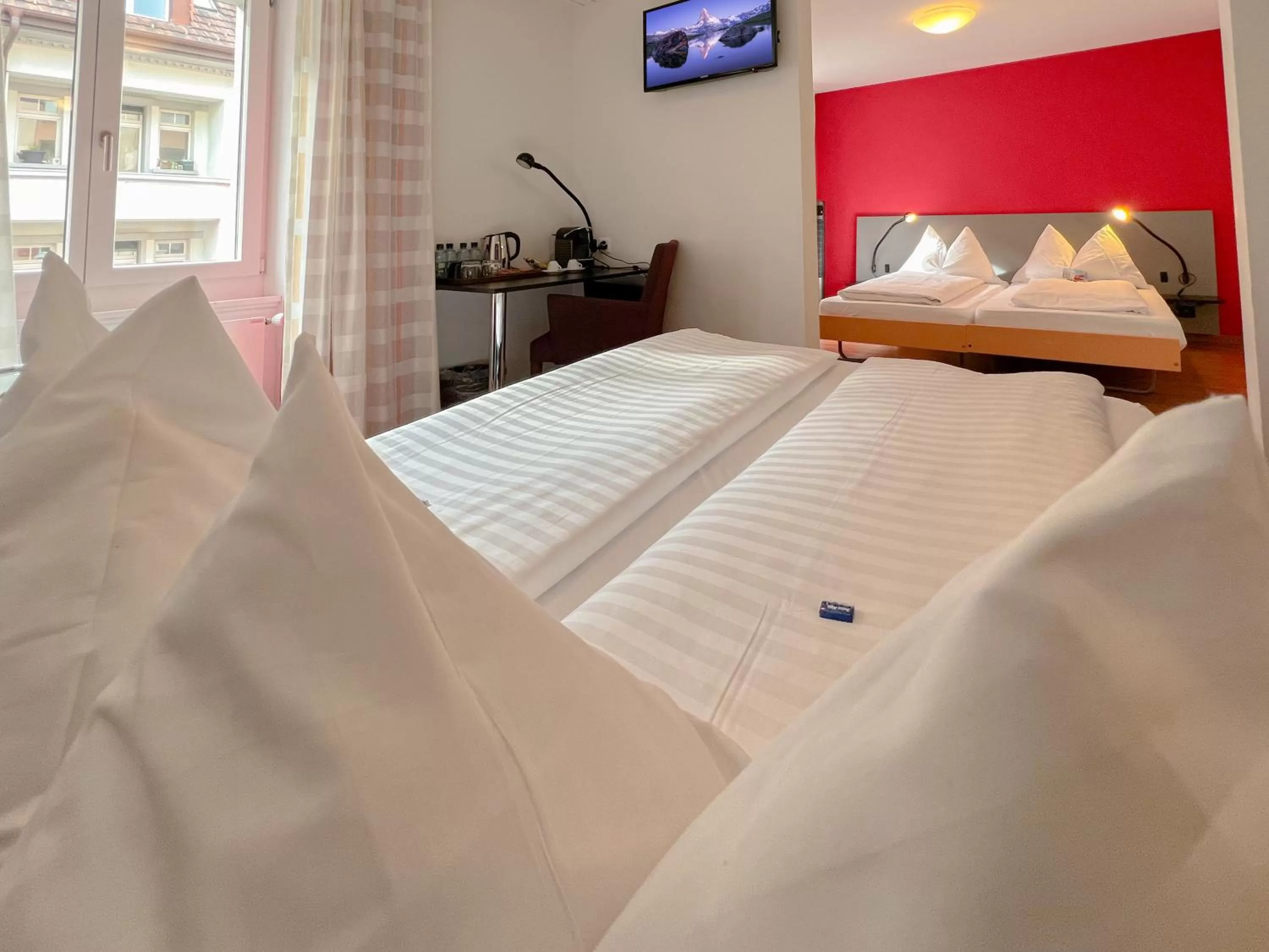 Bed in Hotel Rothaus Luzern & Peruvian Culinary Art