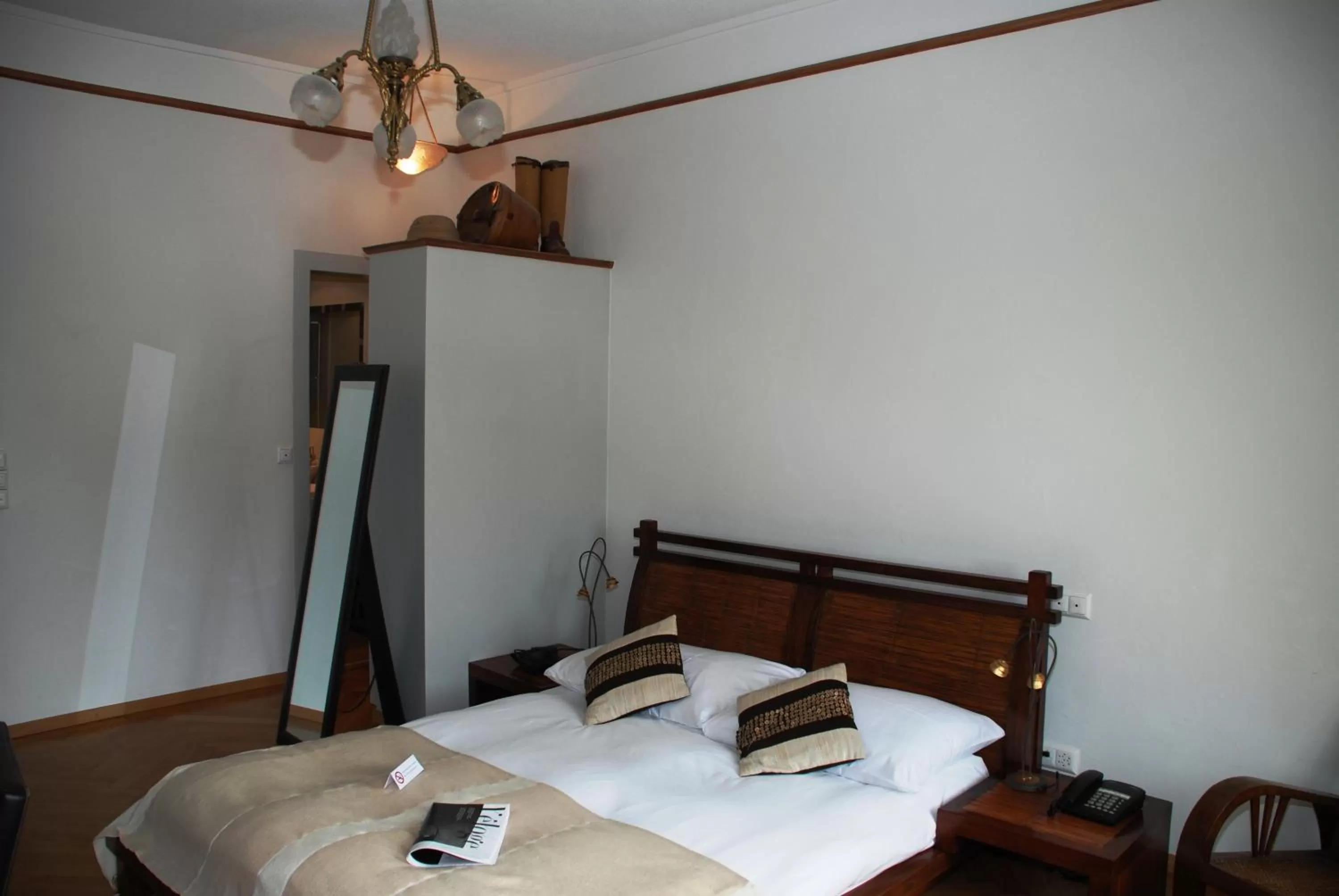 Bed in Hostellerie de Genève