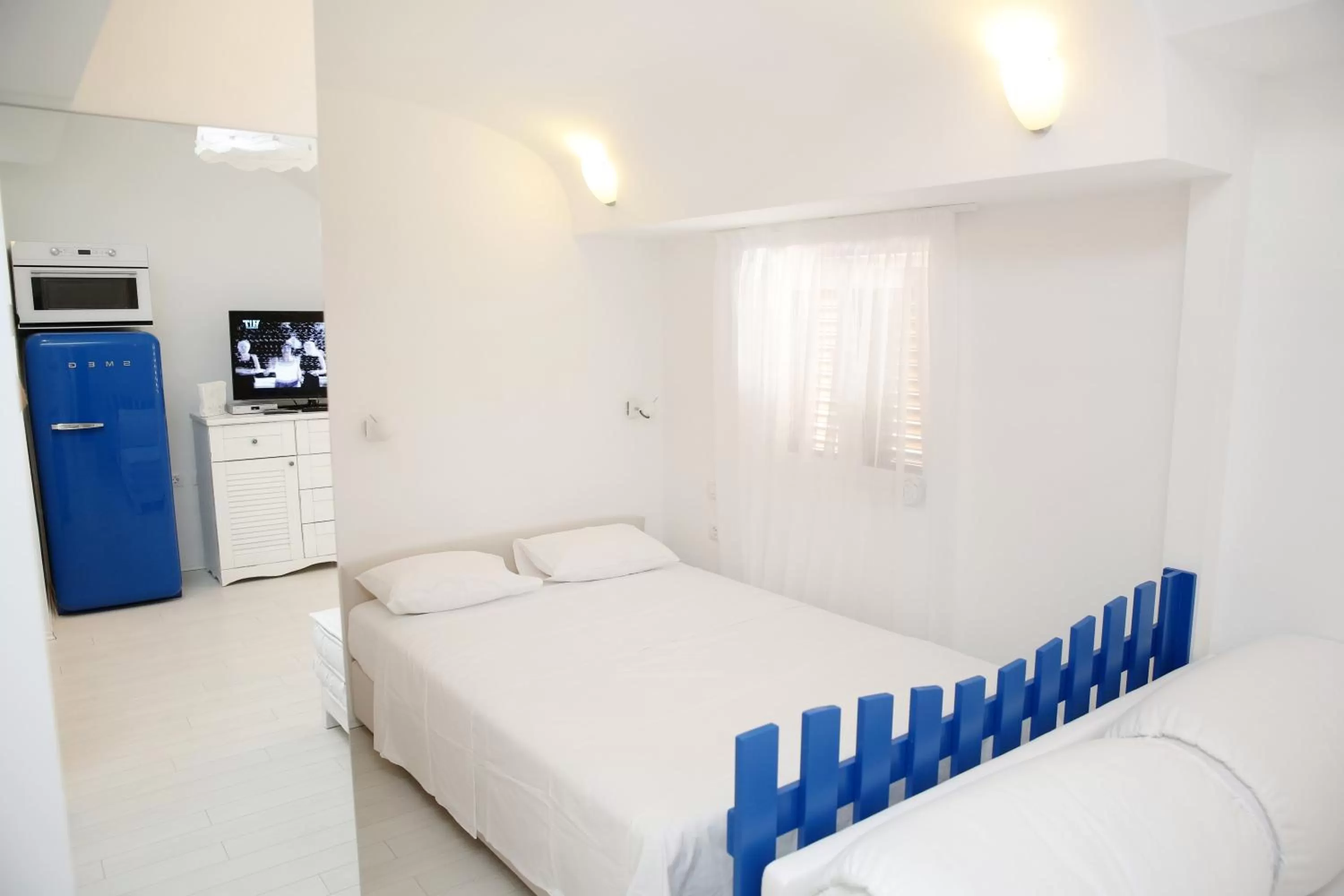 Bed in Central Apartments Integrated Hotel