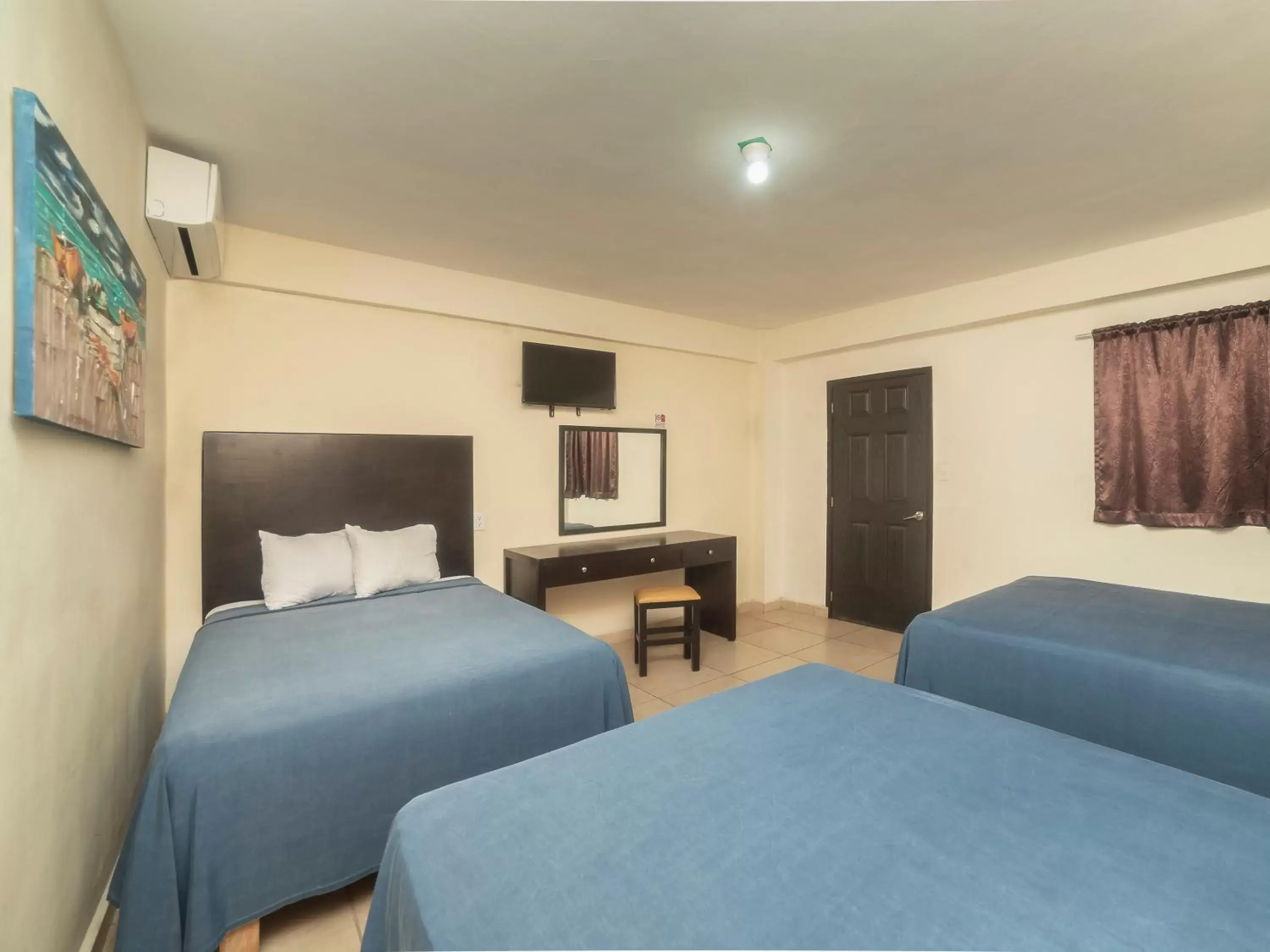 Bedroom, Seating Area in Hotel Puerto Inn