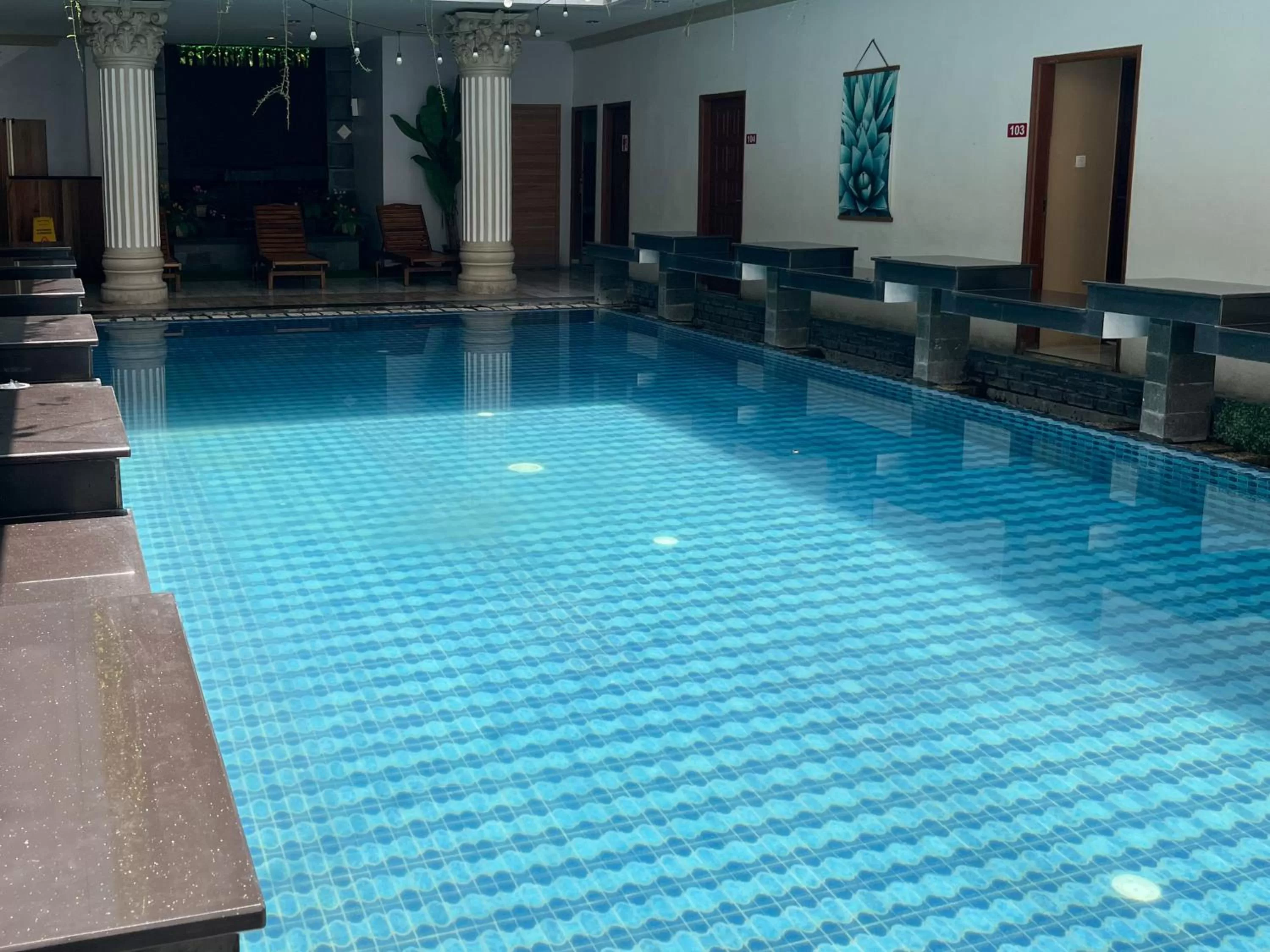 Swimming Pool in RedDoorz Premium Syariah at Mutiara Hijau Suites Medan