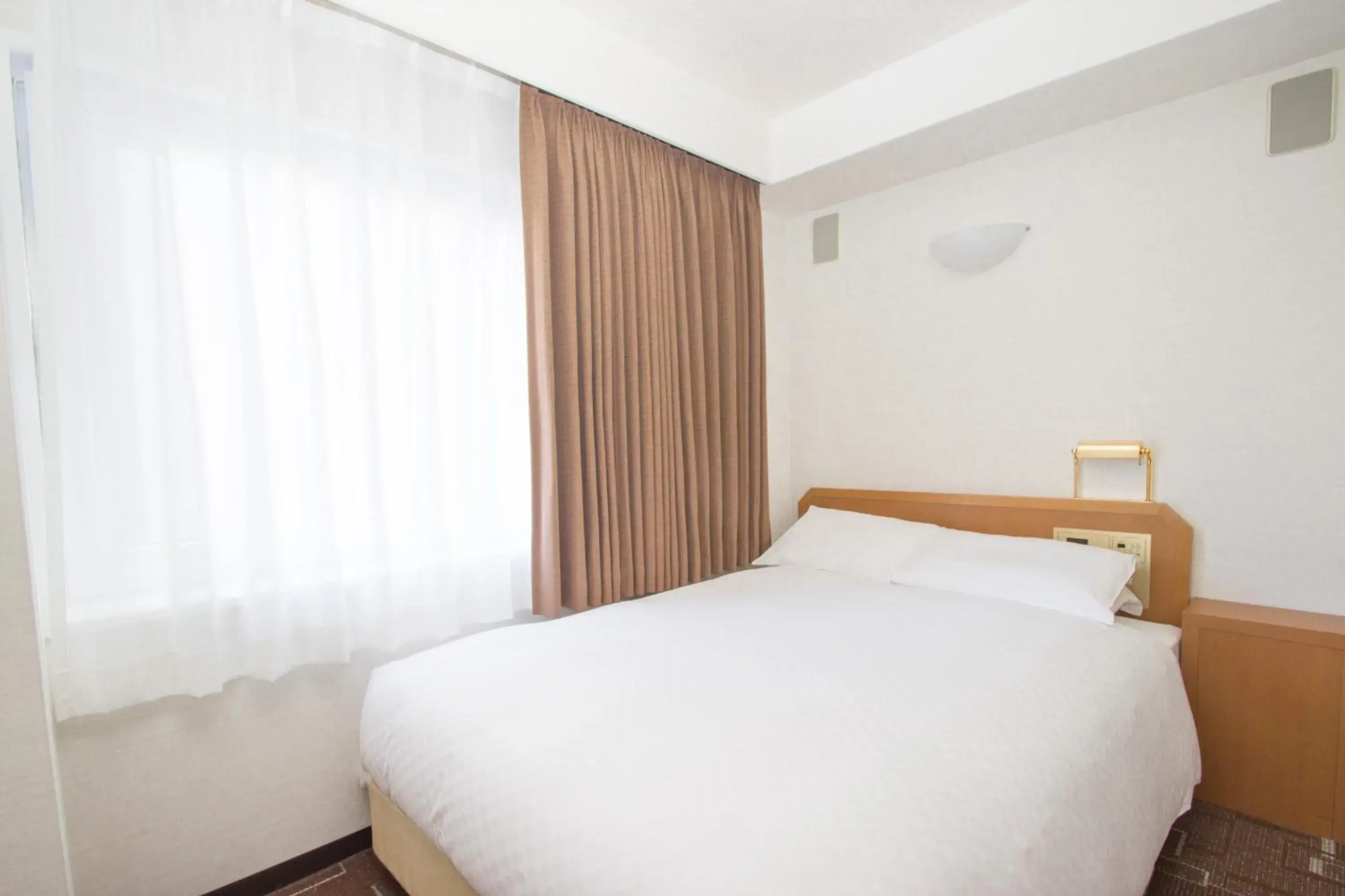 Photo of the whole room, Bed in IP City Hotel Osaka - Imperial Palace Group