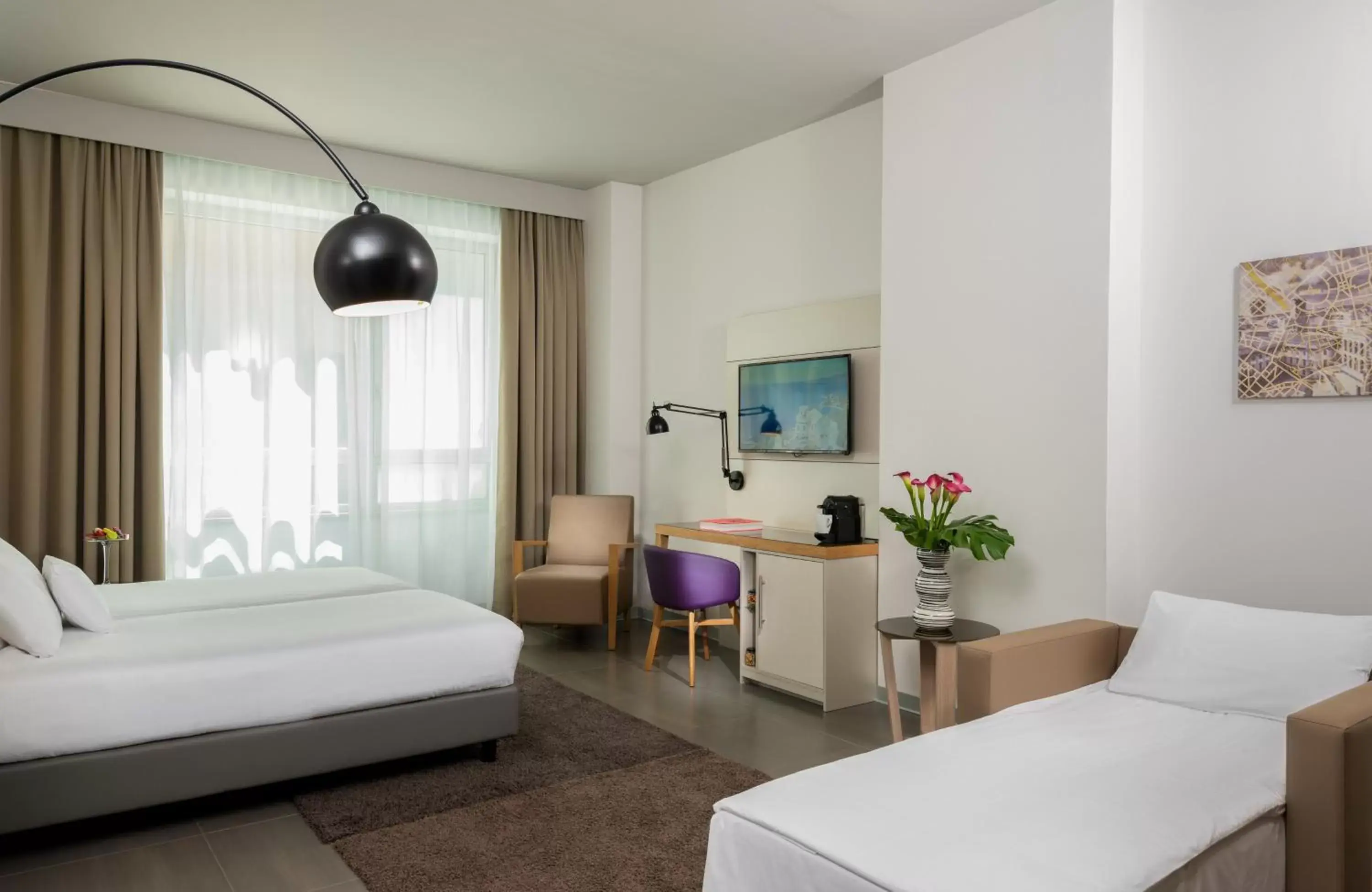 Photo of the whole room, Bed in NYX Hotel Milan by Leonardo Hotels