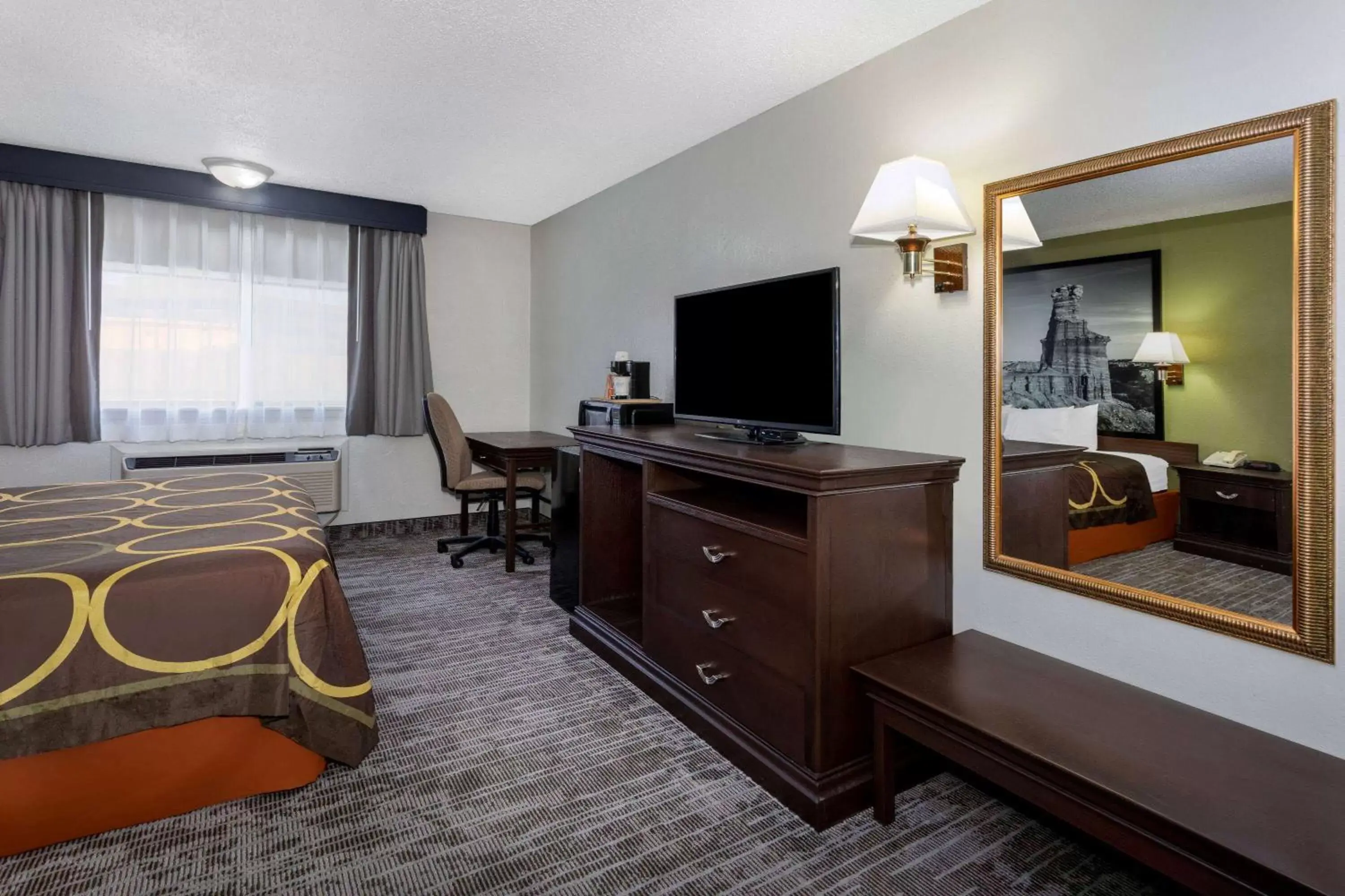 Photo of the whole room, TV/Entertainment Center in Super 8 by Wyndham Amarillo Central TX