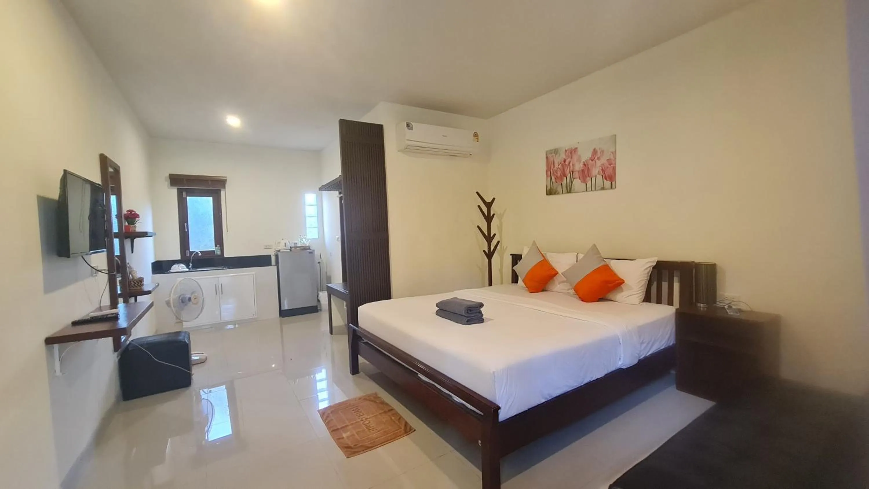 Bed in Baan Suan Rim Klong Resort