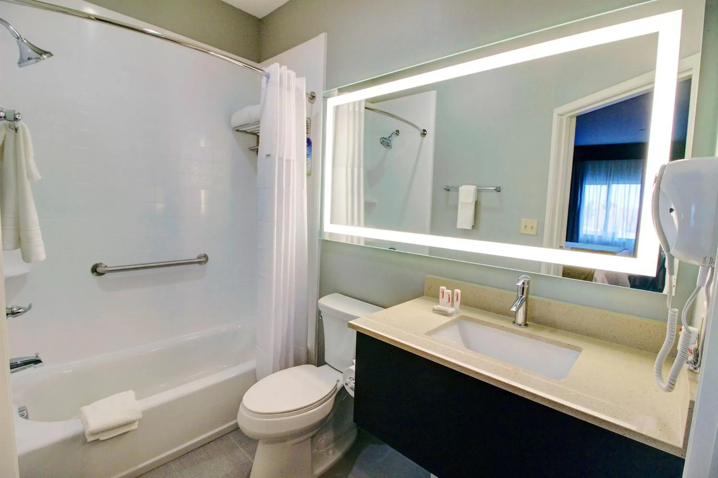 Bathroom in Days Inn & Suites by Wyndham Port Arthur