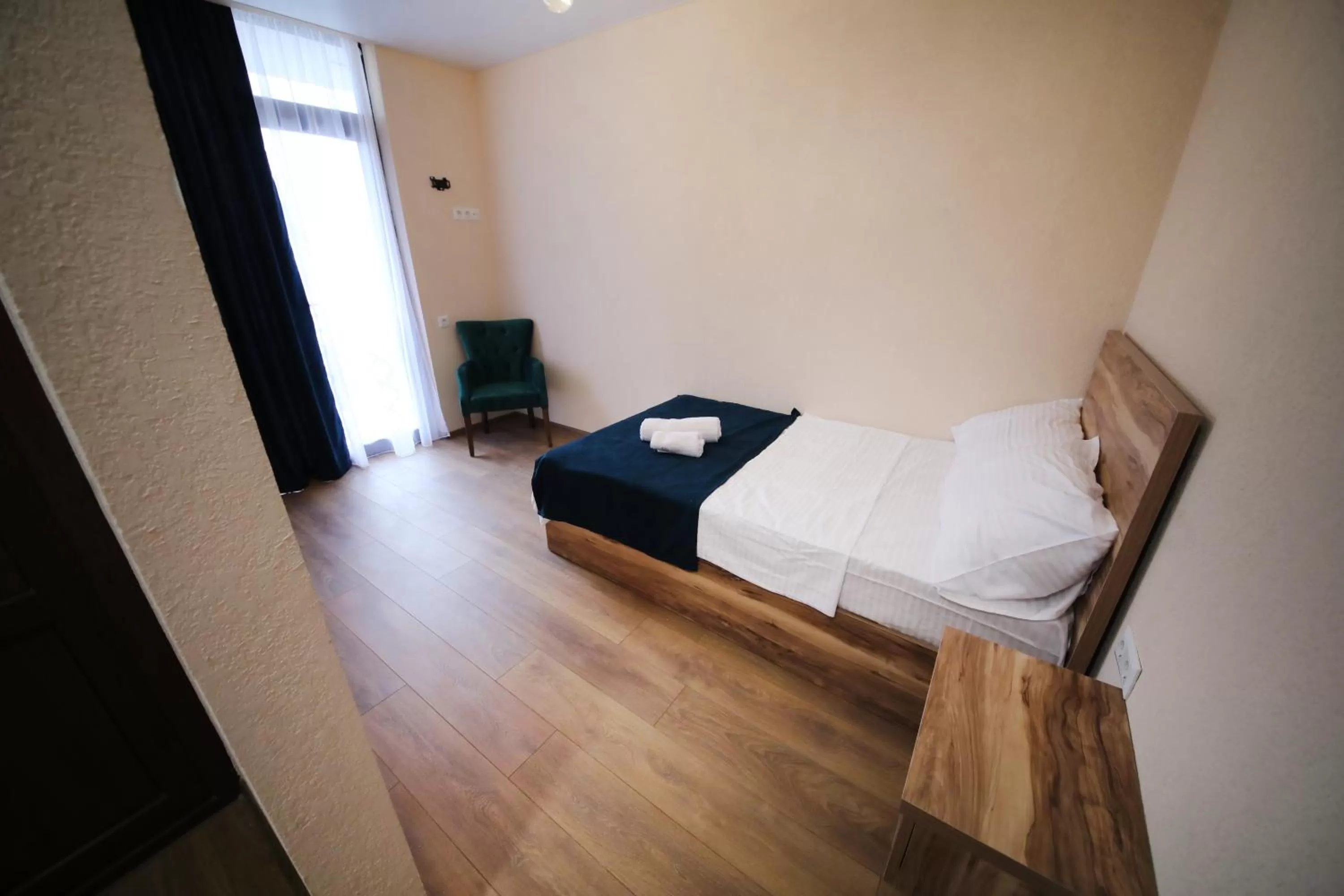 Bed in Bessarion Boutique Hotel