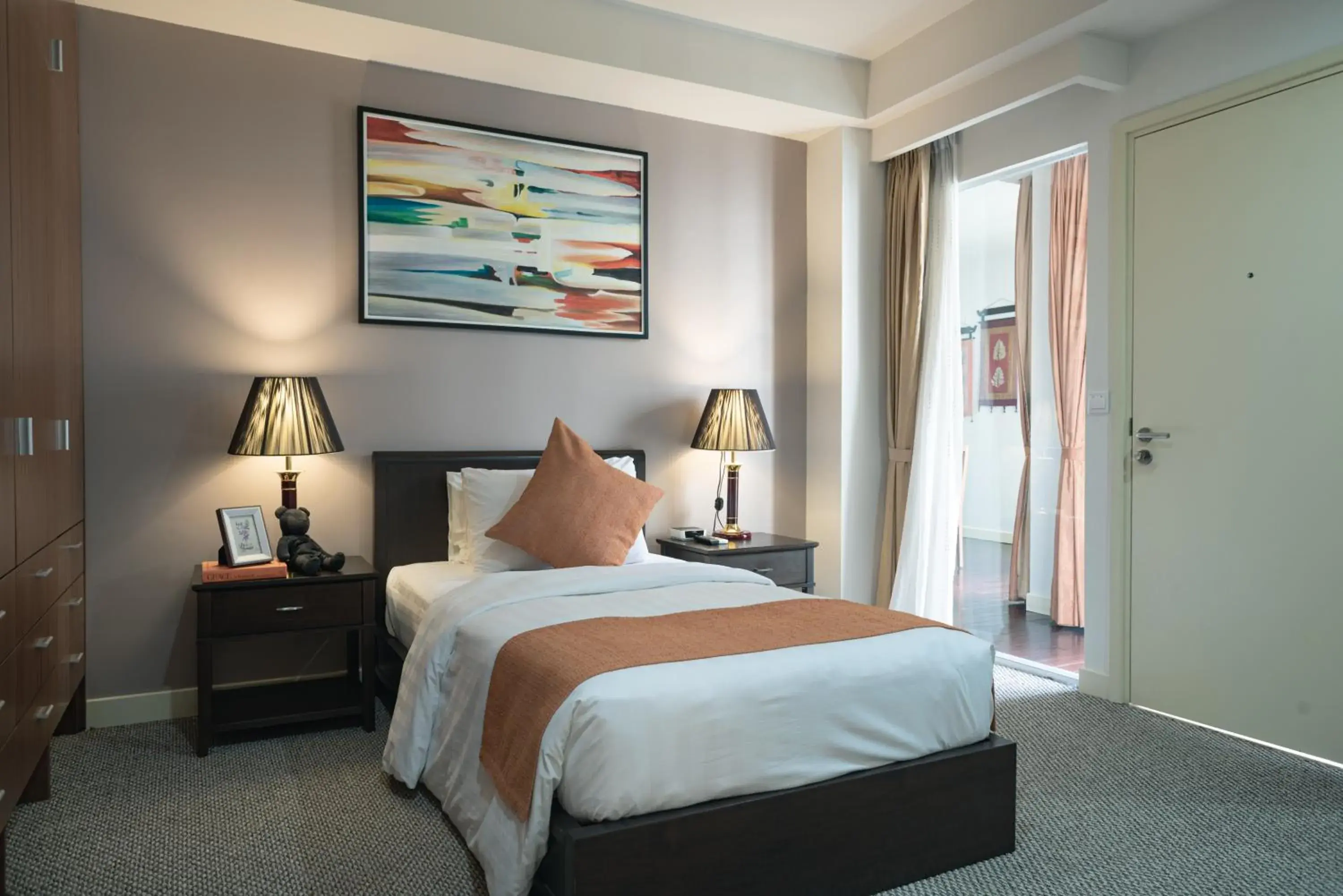 Bed in Central Mansions Serviced Apartments