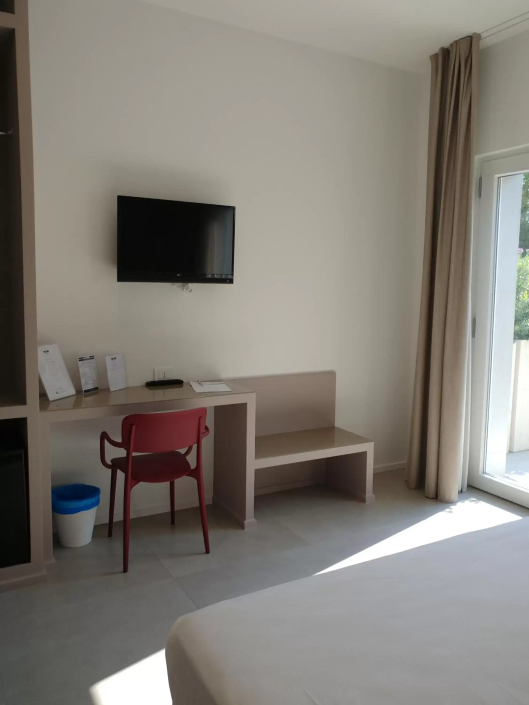 Bedroom, TV/Entertainment Center in SALAPIA SALIS RESORT