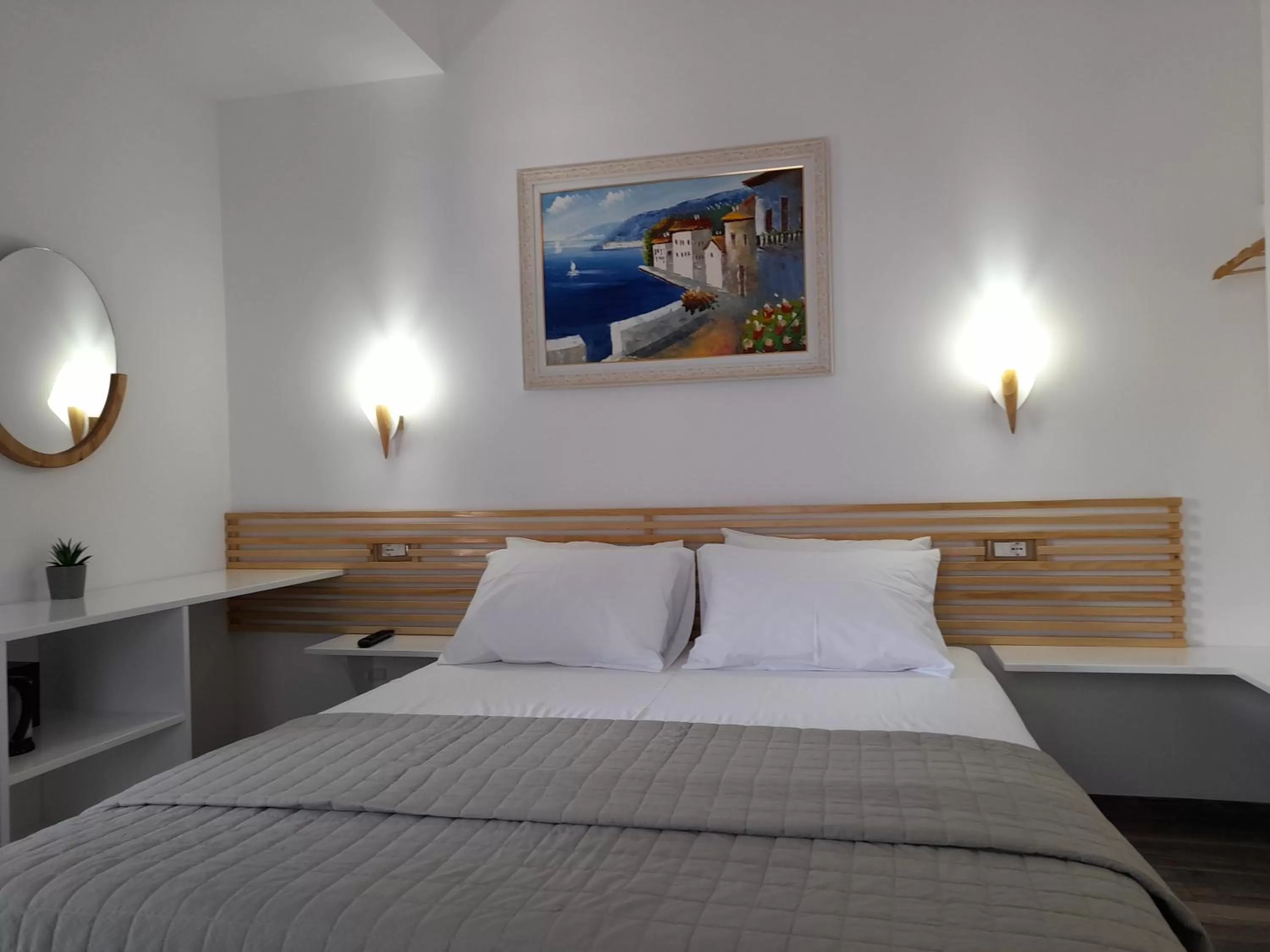 Bed in Anxhelos Hotel