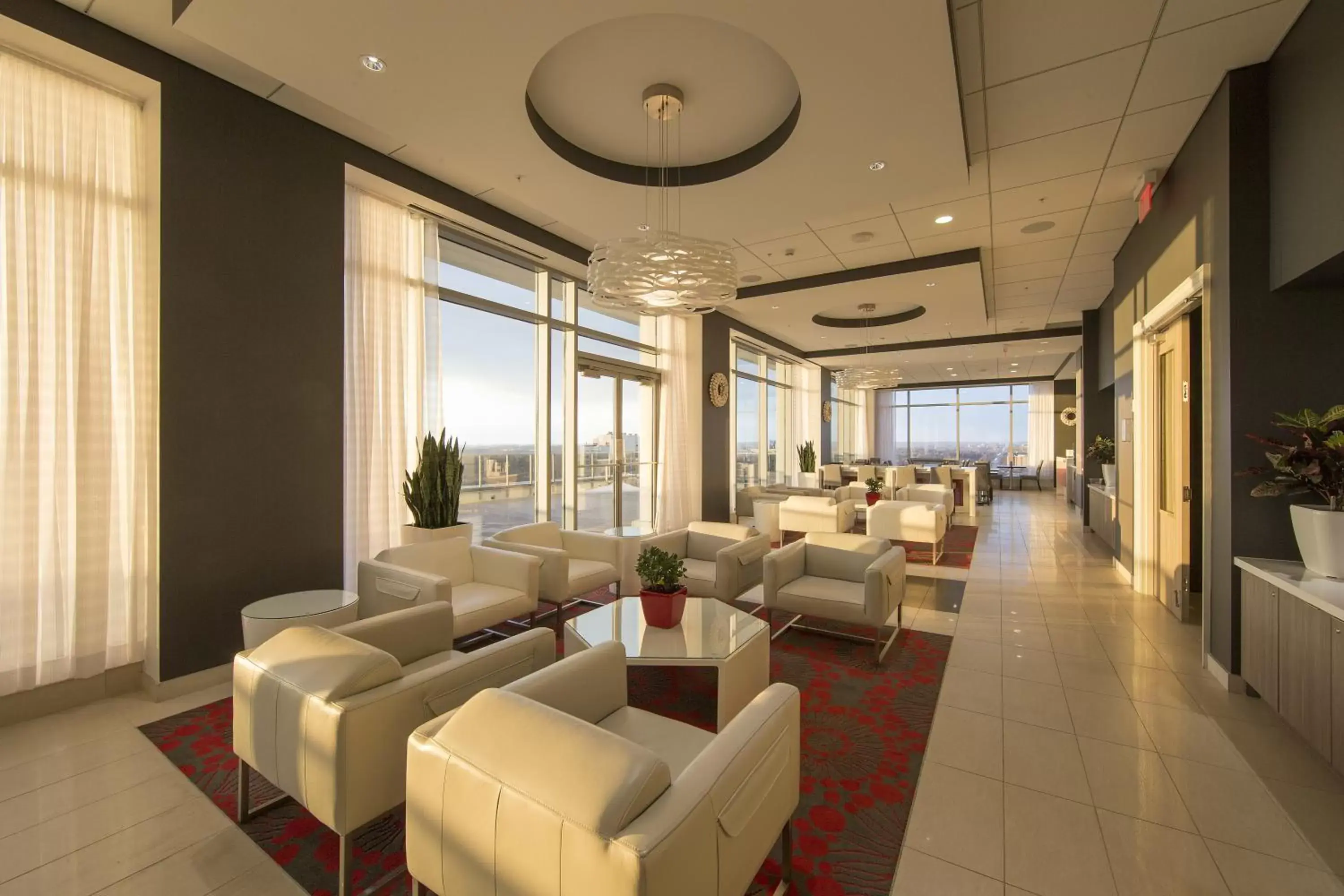 Lobby or reception, Lounge/Bar in Liberty Suites