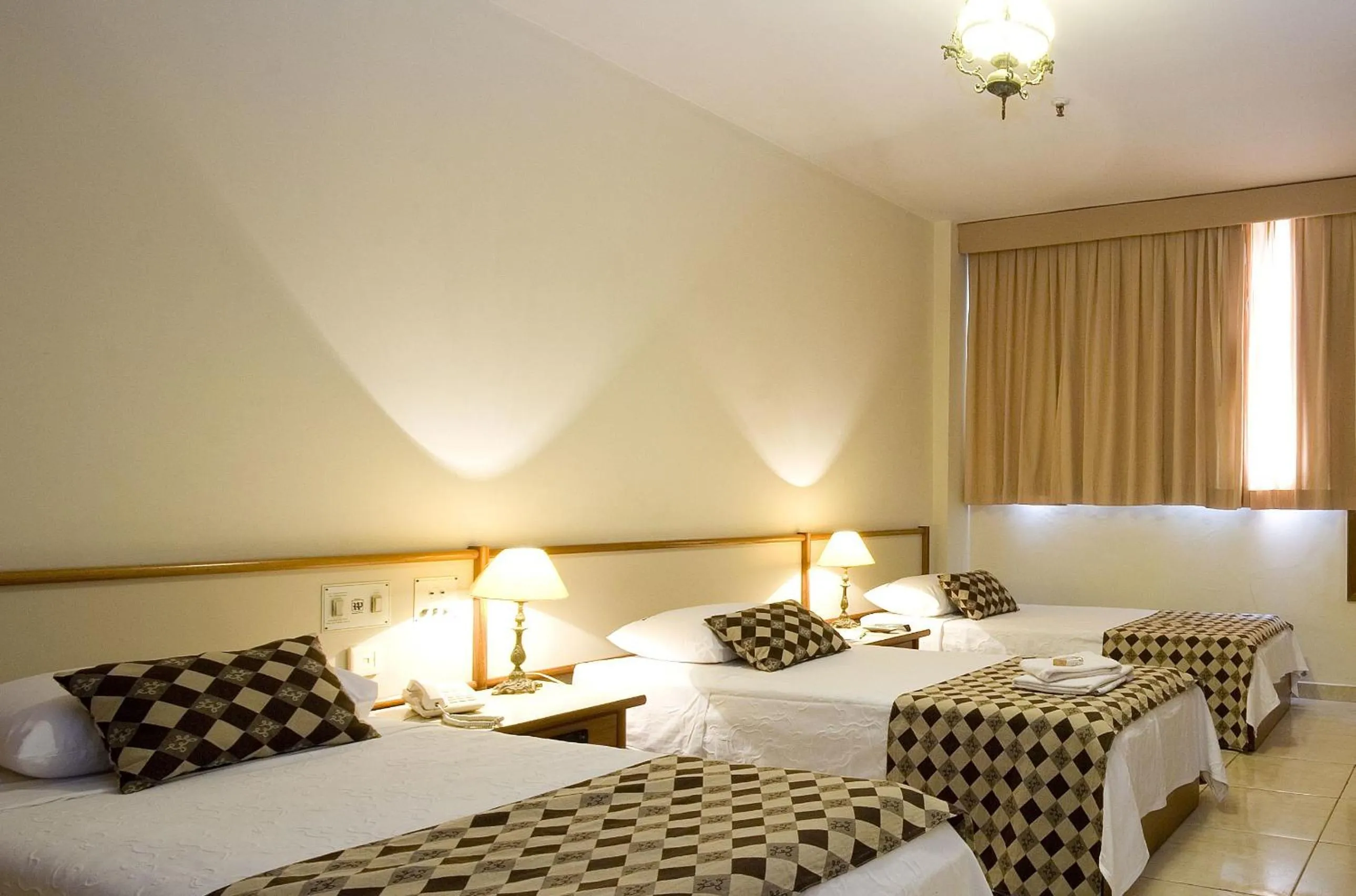 Bed in Hotel Rondônia Palace