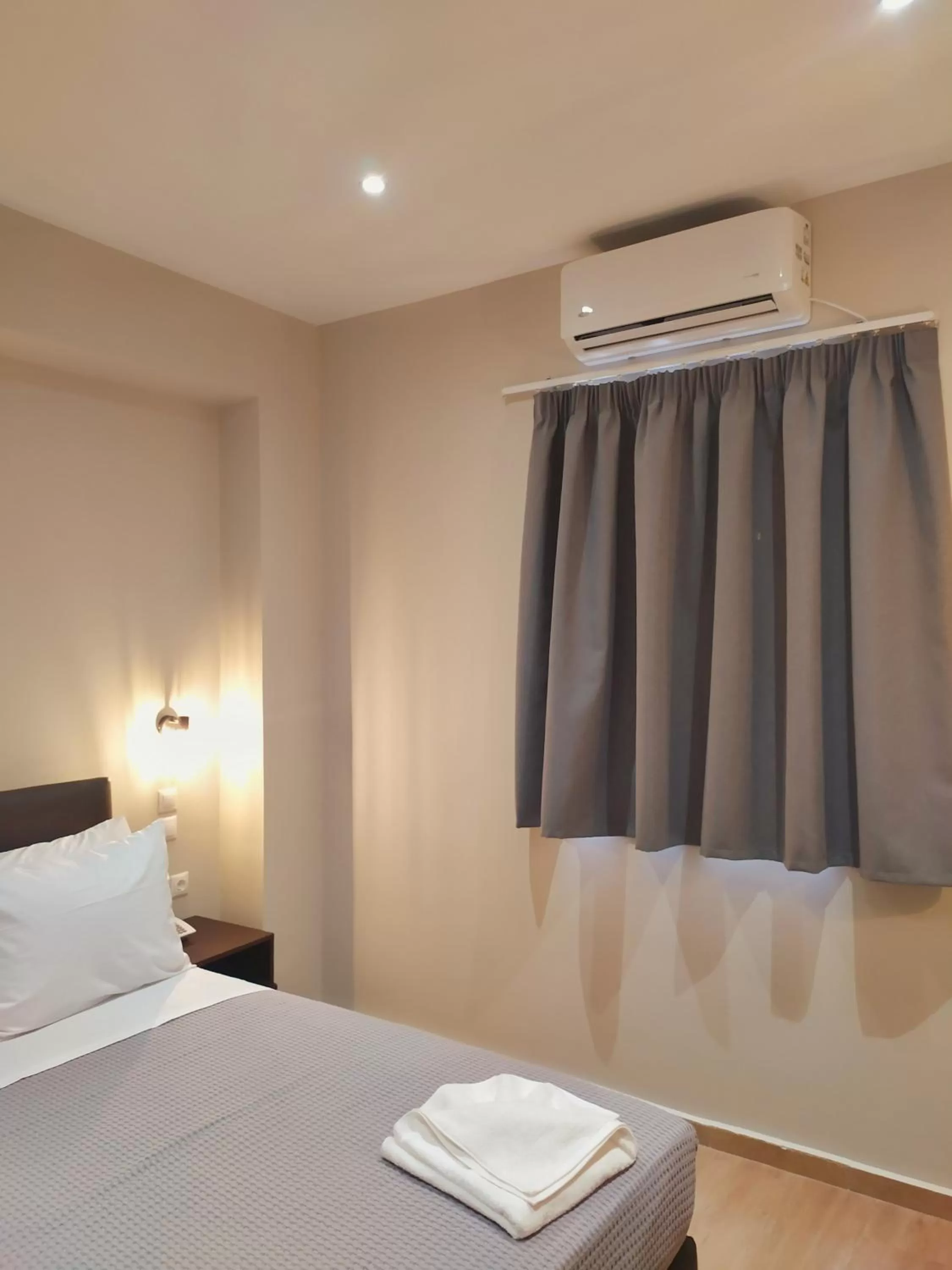 Bed in New Amaryllis Hotel