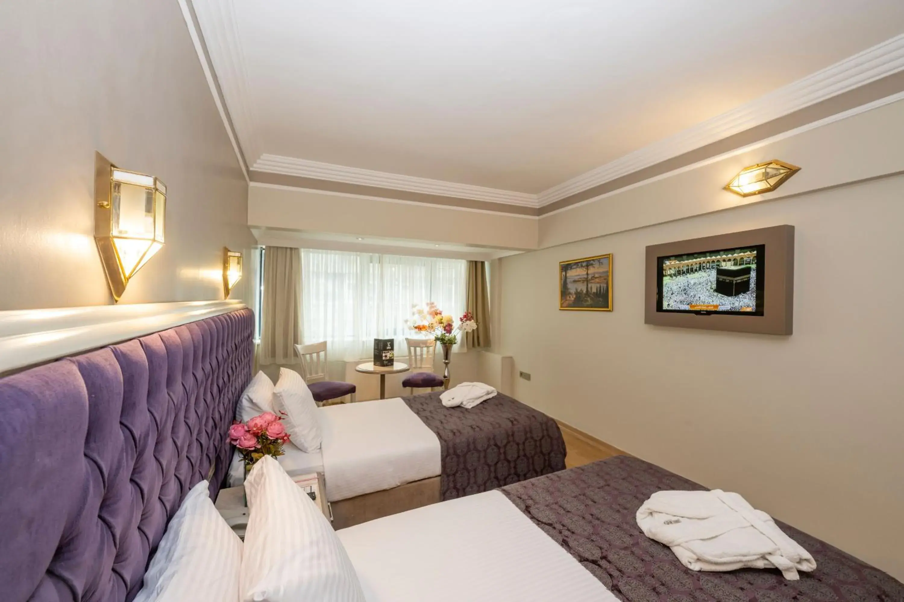 Bed in Grand Anka Hotel