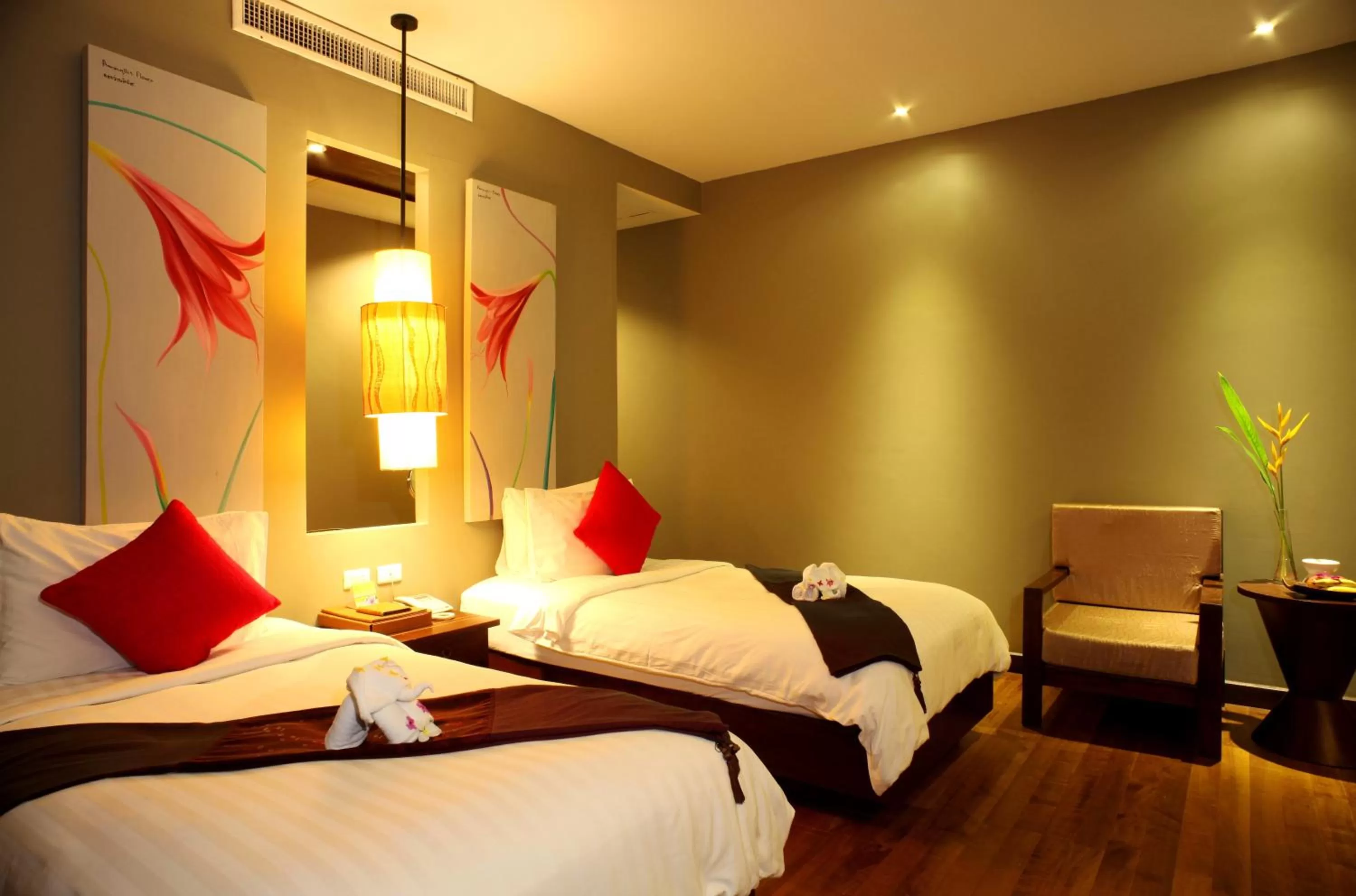 Bed in Chongfah Resort Khao Lak - SHA Extra Plus