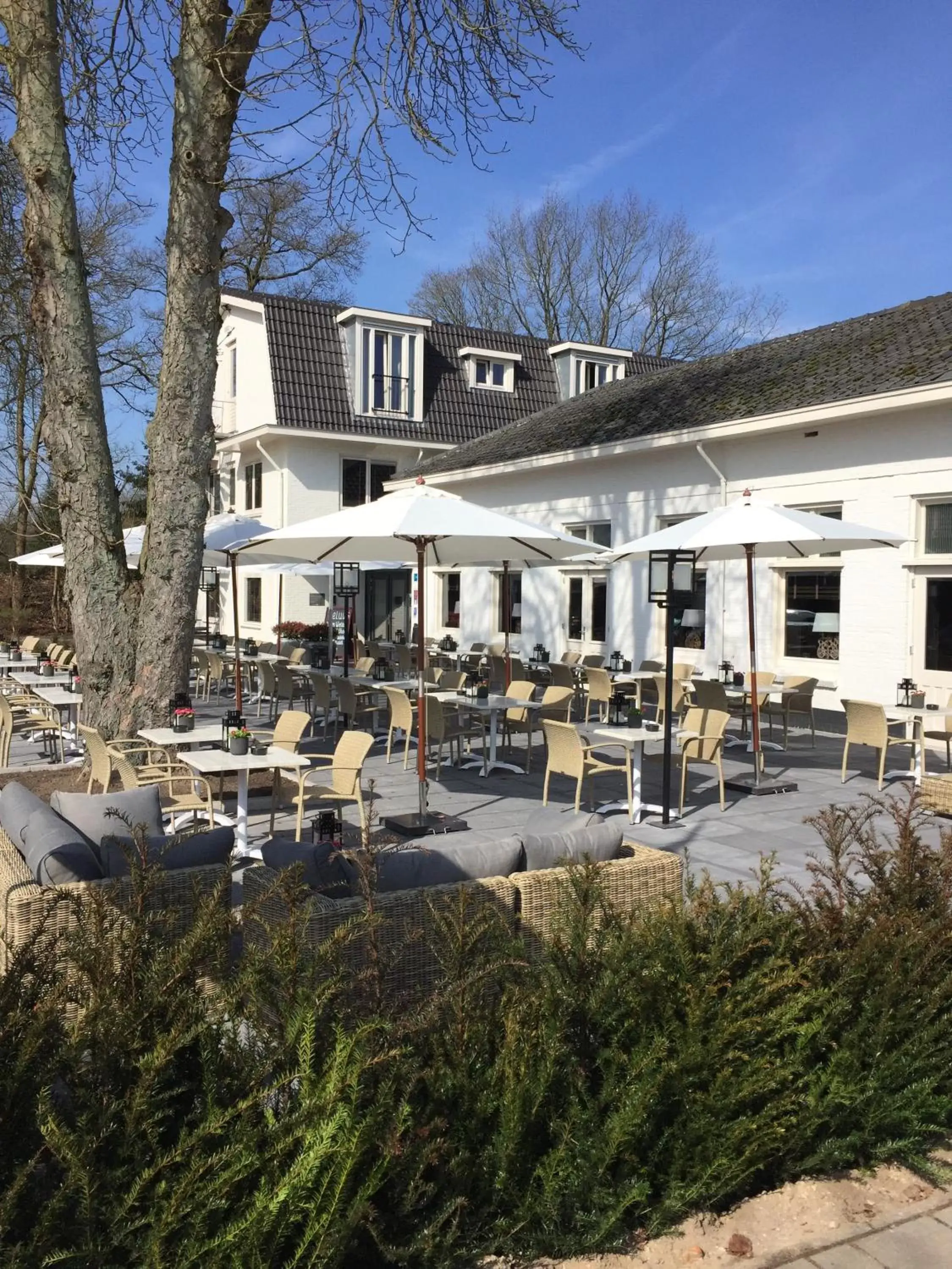 Patio, Property Building in Fletcher Hotel Het Veluwse Bos