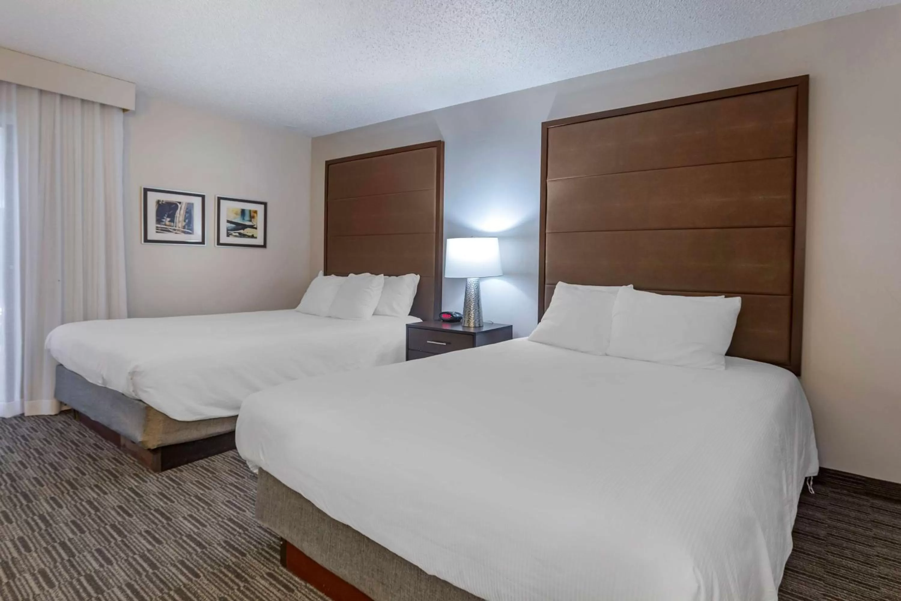 Bedroom in Best Western Plus Como Park Hotel